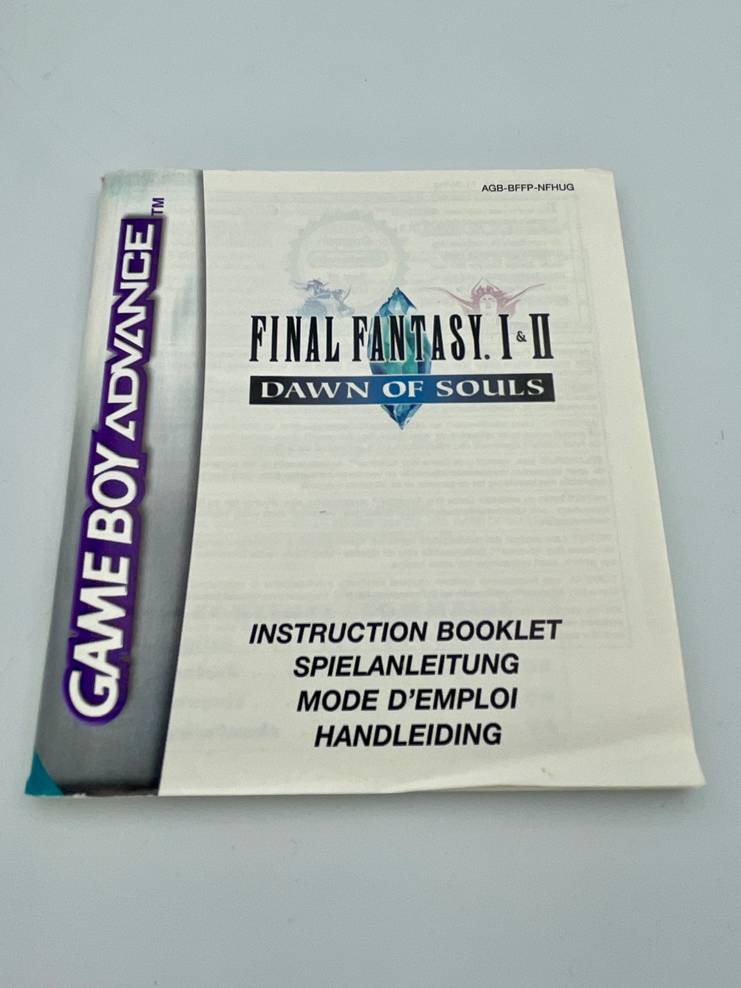 Game Boy Advance Final Fantasy I-II Dawn of Souls instruction booklet on a gray background