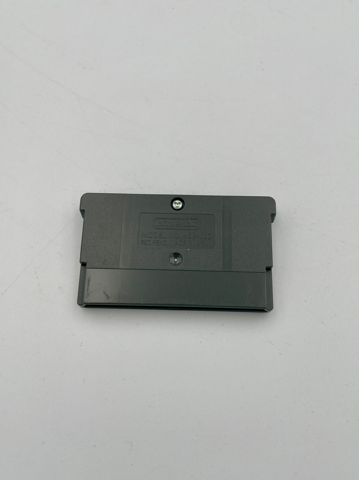 Black cartridge on a light gray background