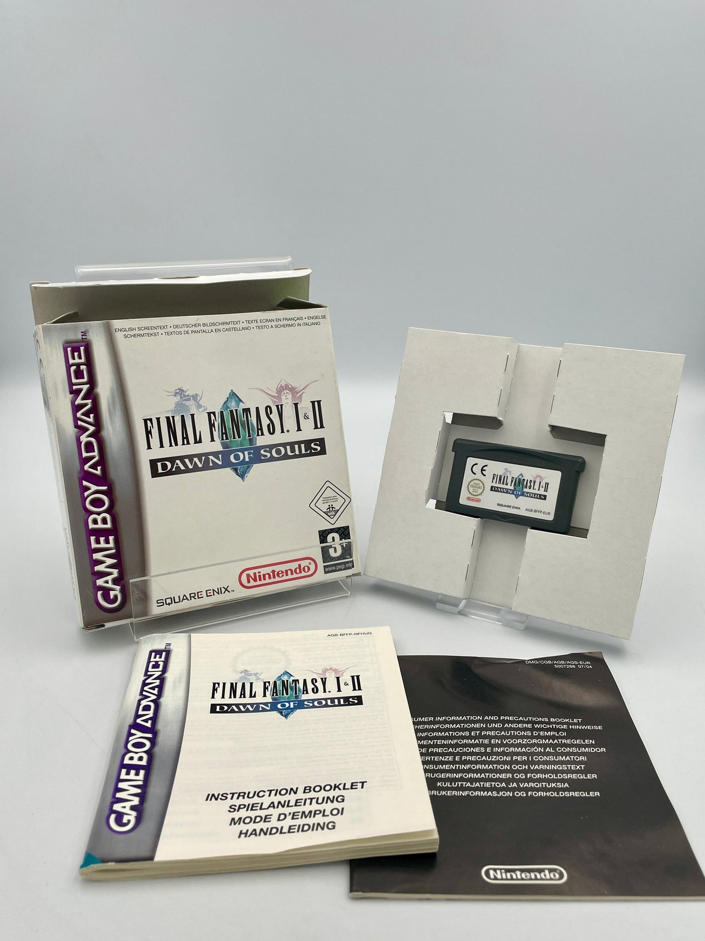 Nintendo Game Boy Advance Final Fantasy I-II game cartridge with manual and box on a white background