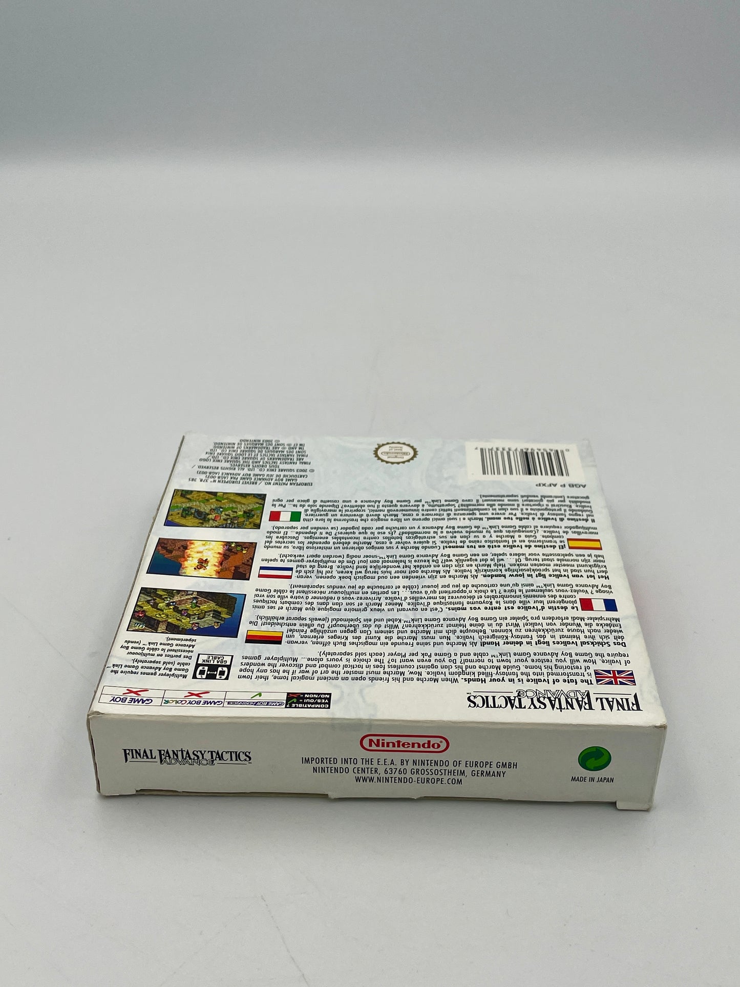 Back of a video game case for 'Final Fantasy Tactics' on a gray background