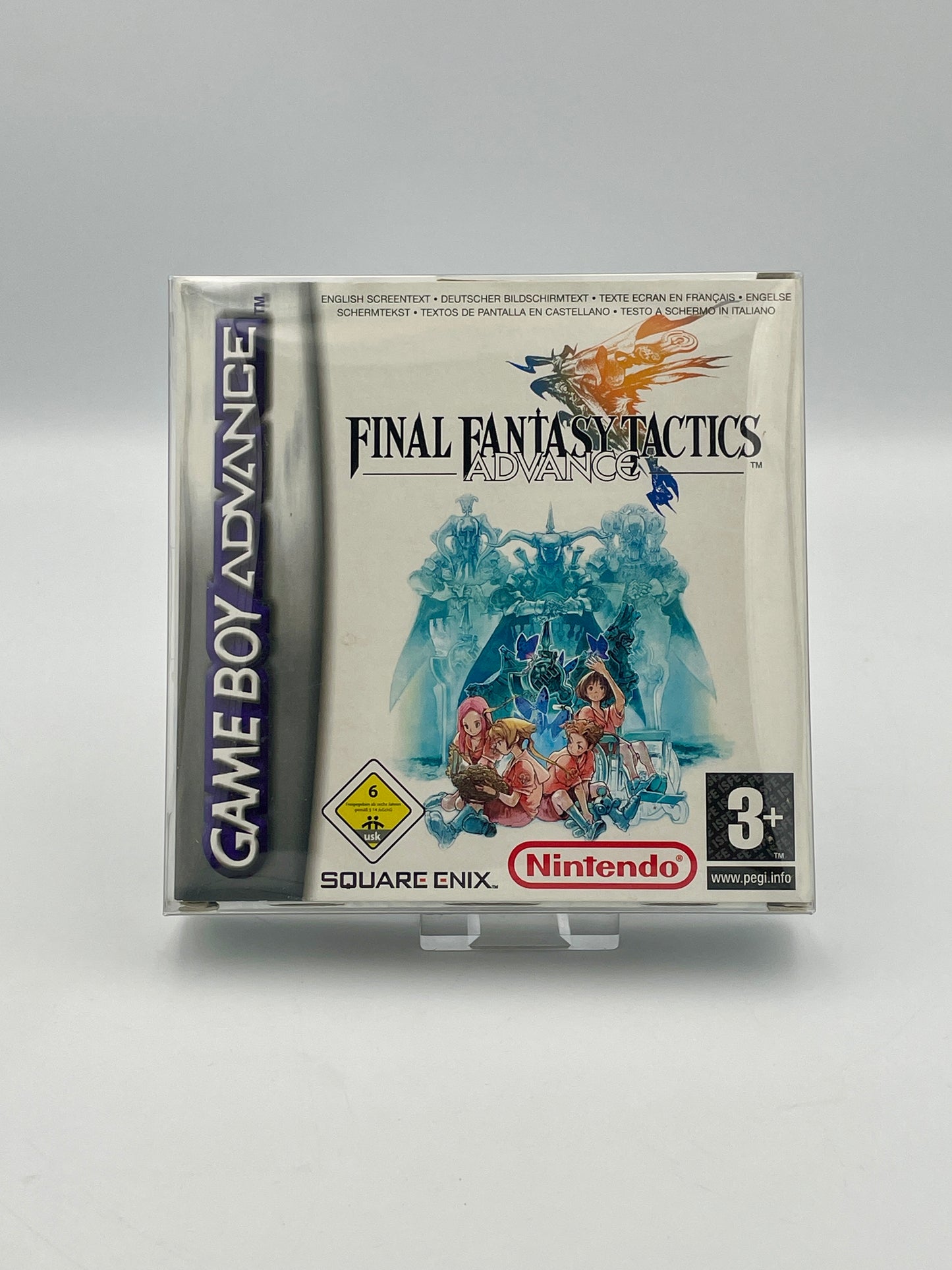 Game Boy Advance cartridge of 'Final Fantasy Tactics' on a gray background