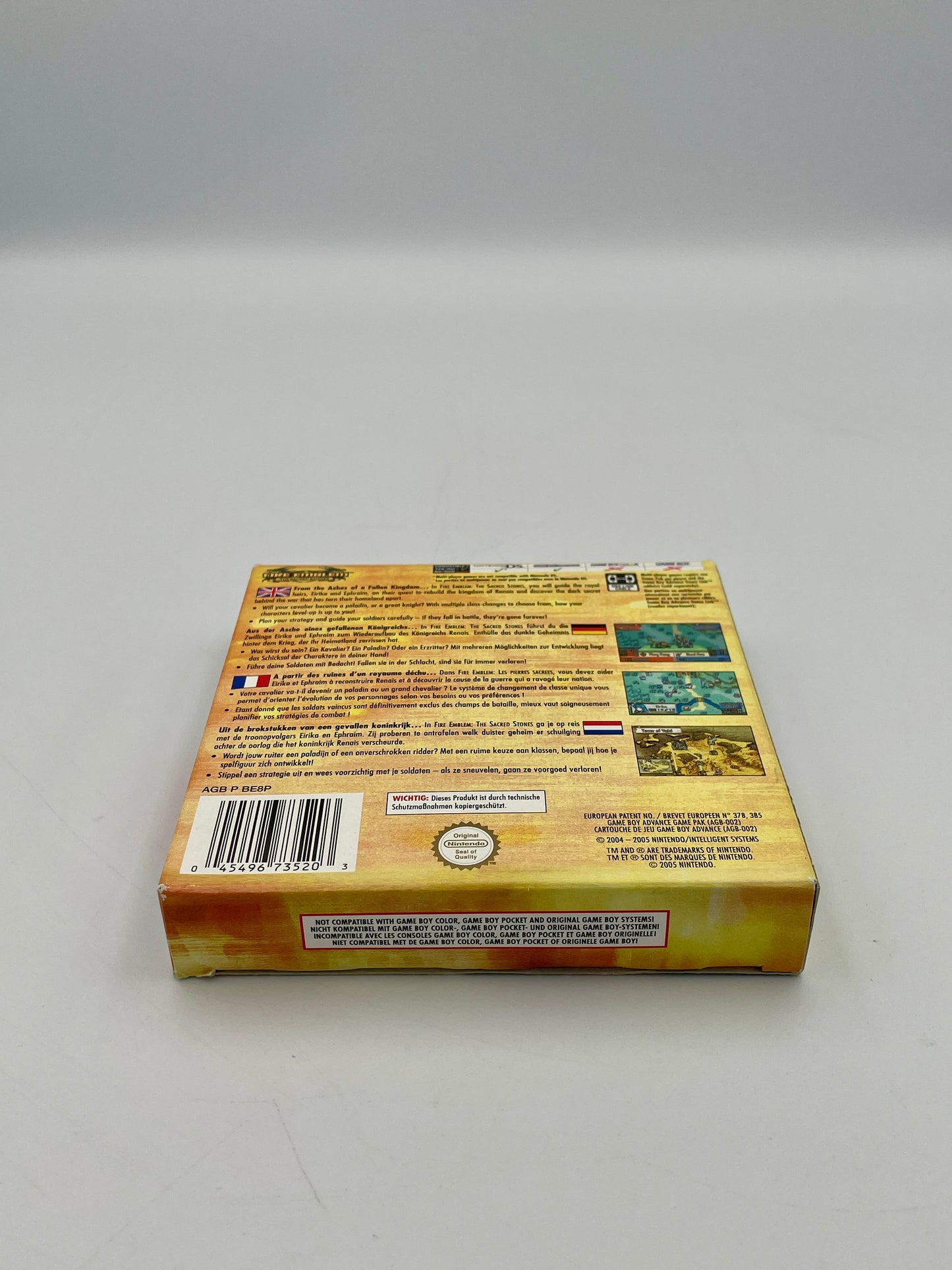 Product packaging with text and a barcode on a gray background