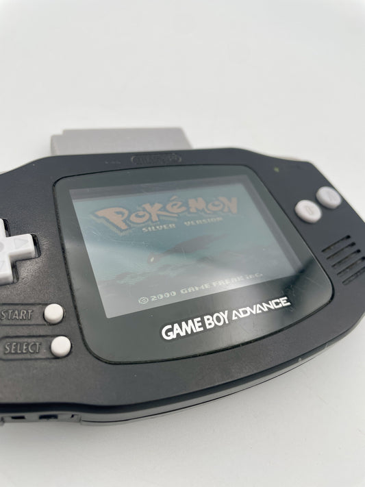 Game Boy Advance displaying a Pokémon game on a white background