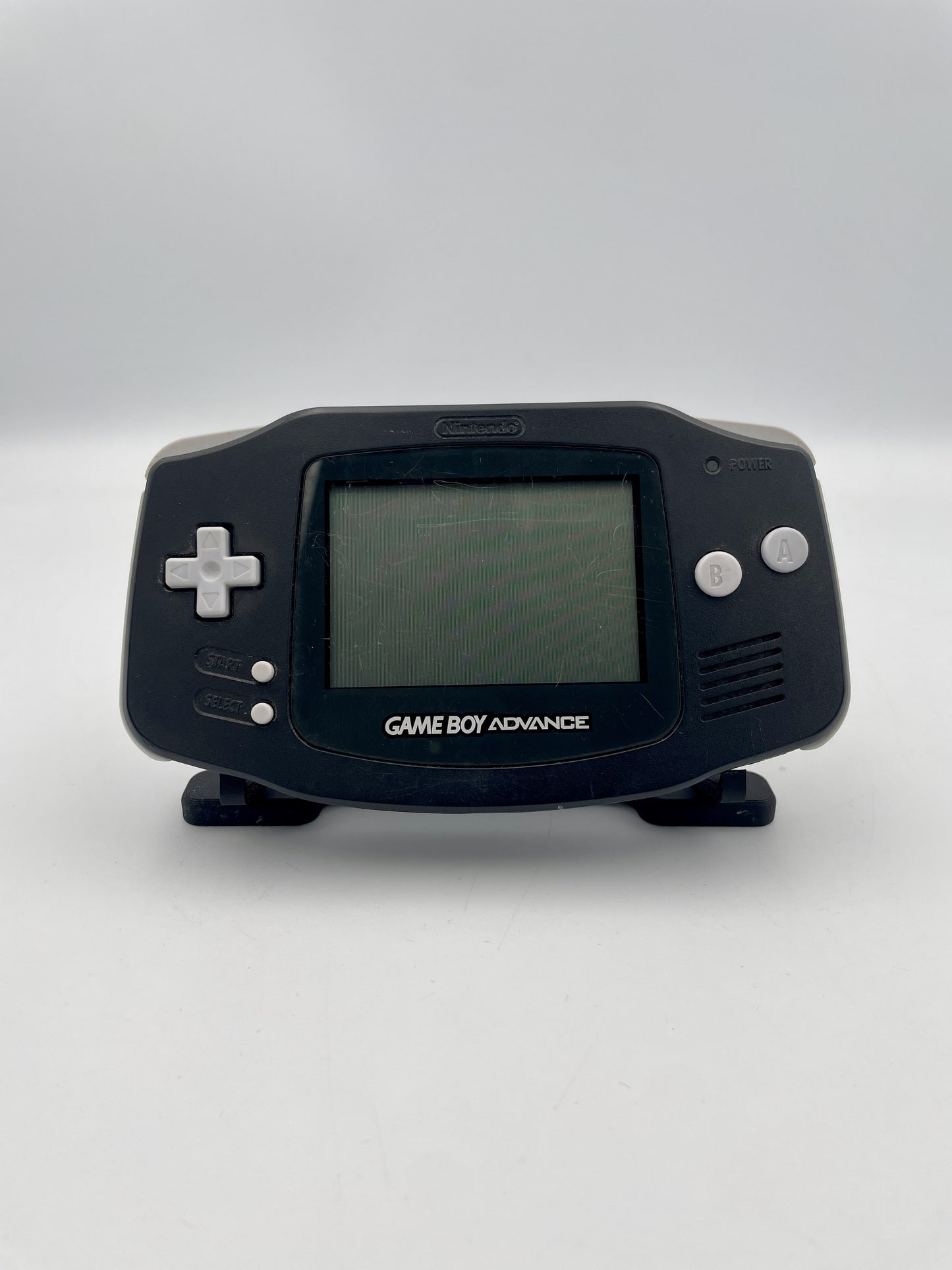 Black Game Boy Advance on a white background