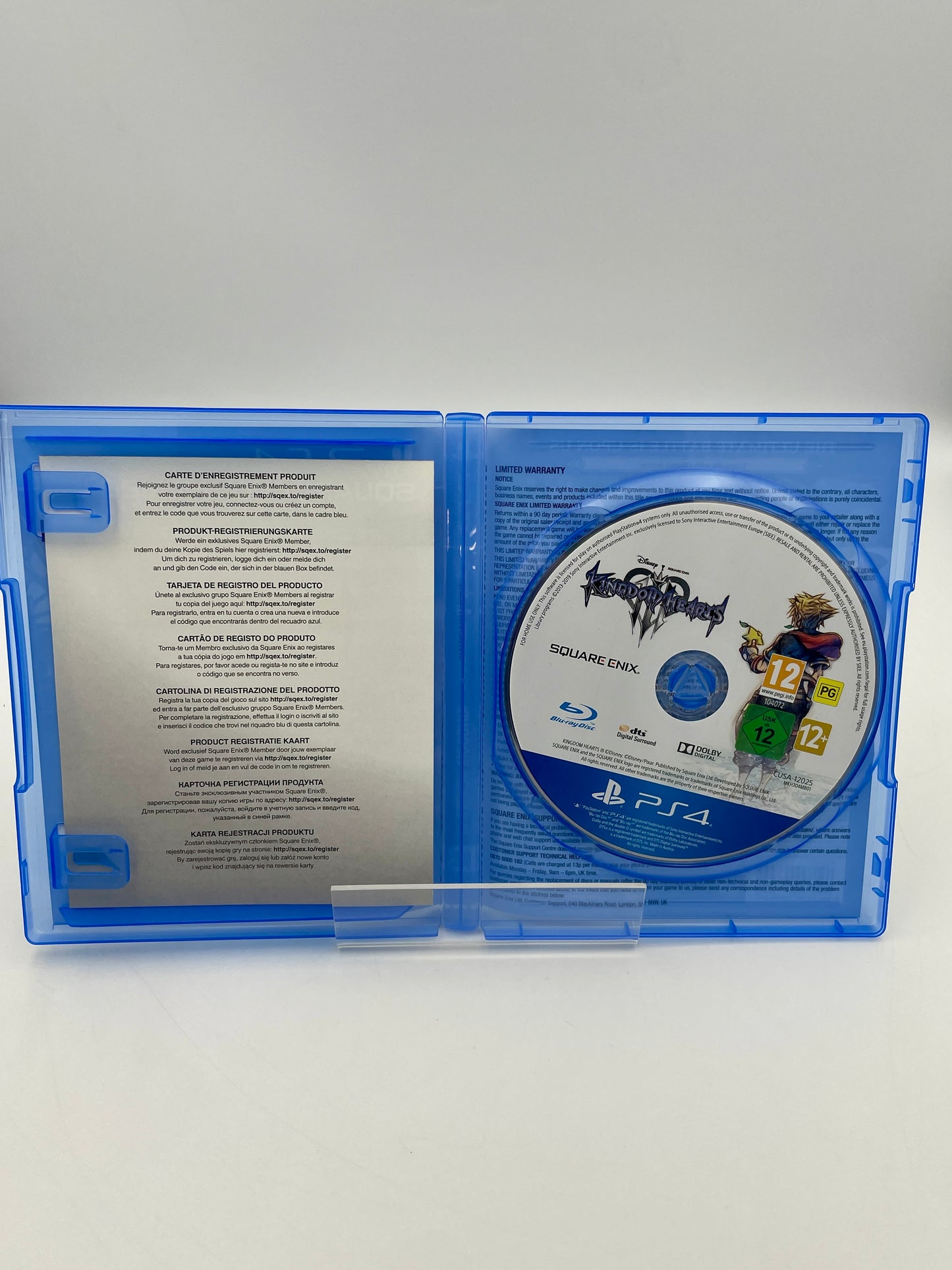 PlayStation game disc in a blue case on a white background