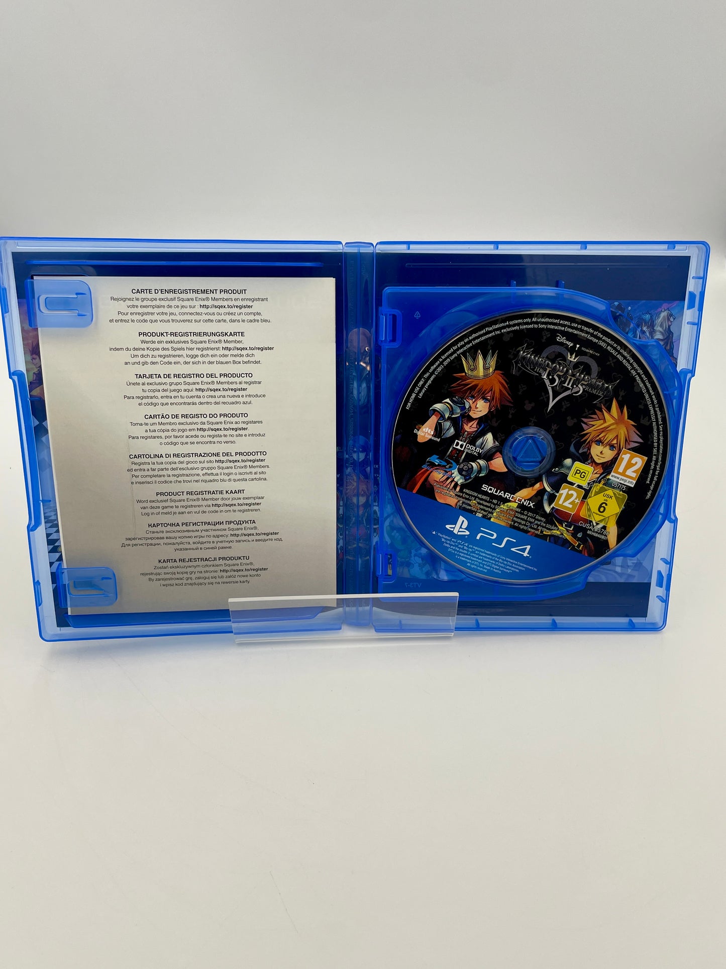 PlayStation 4 game disc in a blue case on a white background