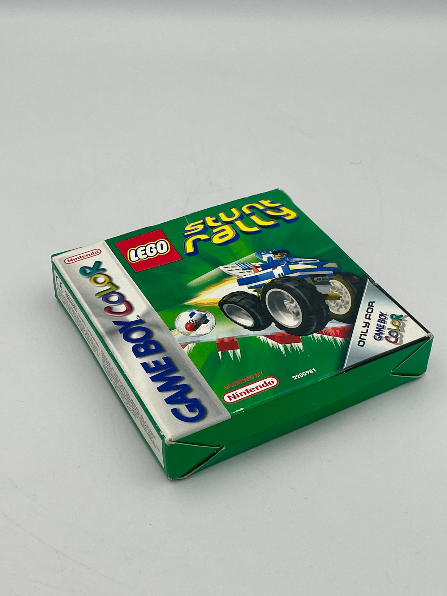 Box for LEGO Stunt Rally Game Boy Color game on a gray background