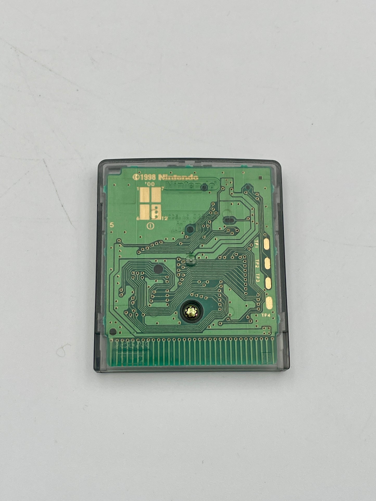 Green circuit board on a gray background