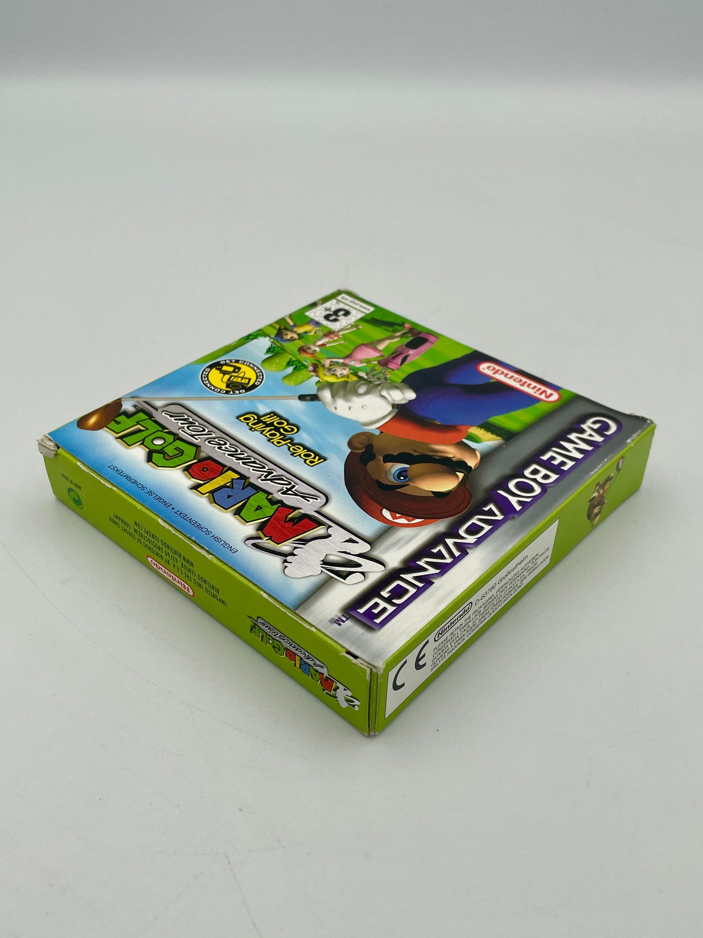 Nintendo Game Boy Advance packaging with a green and blue design on a white background