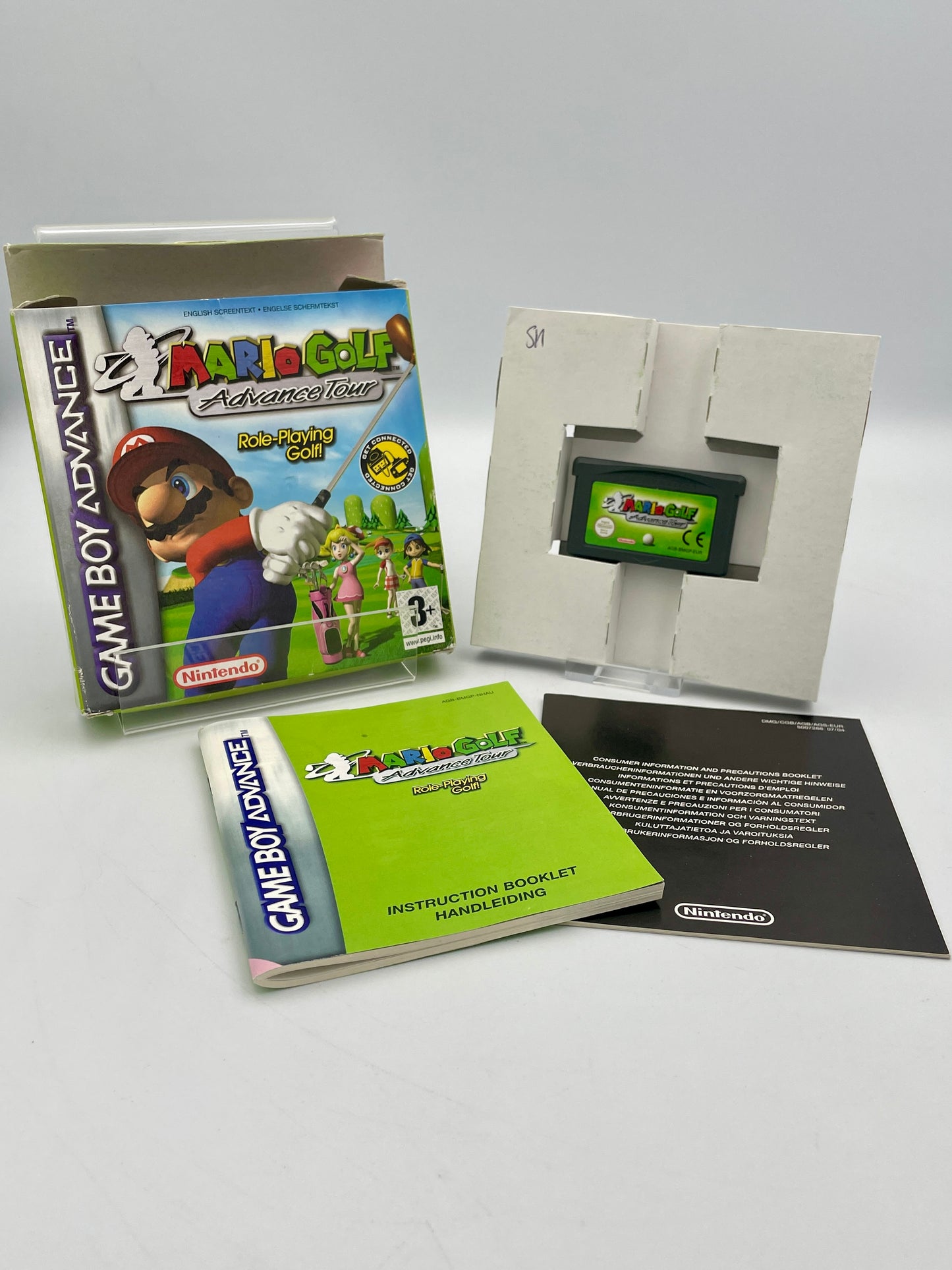 Super Mario Advance 4 game for Game Boy Advance with packaging and manual on a white background