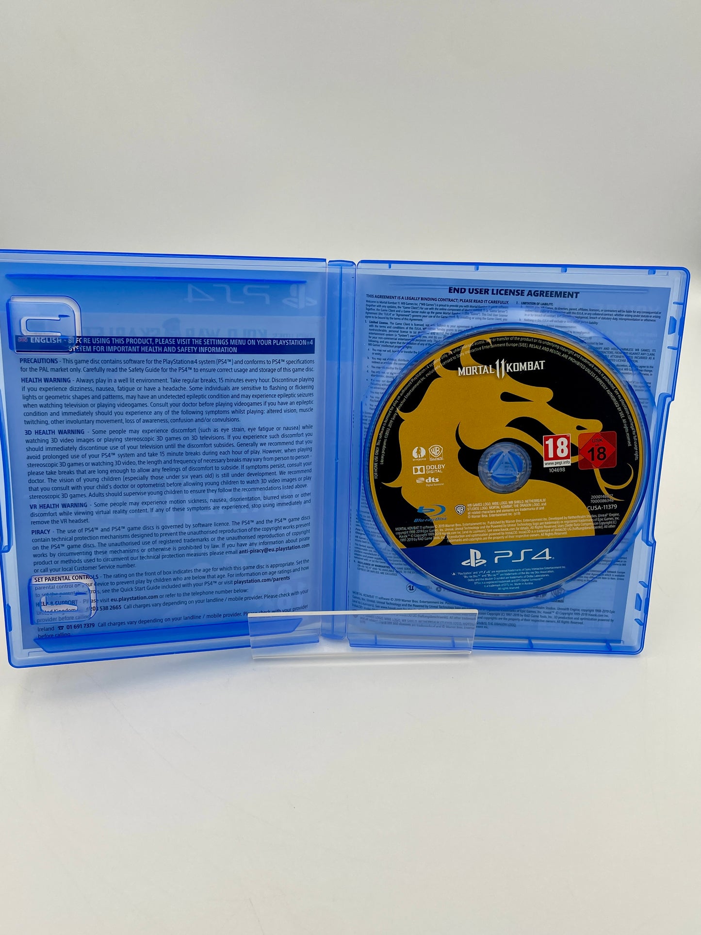 PlayStation 4 game disc in a blue case on a white background