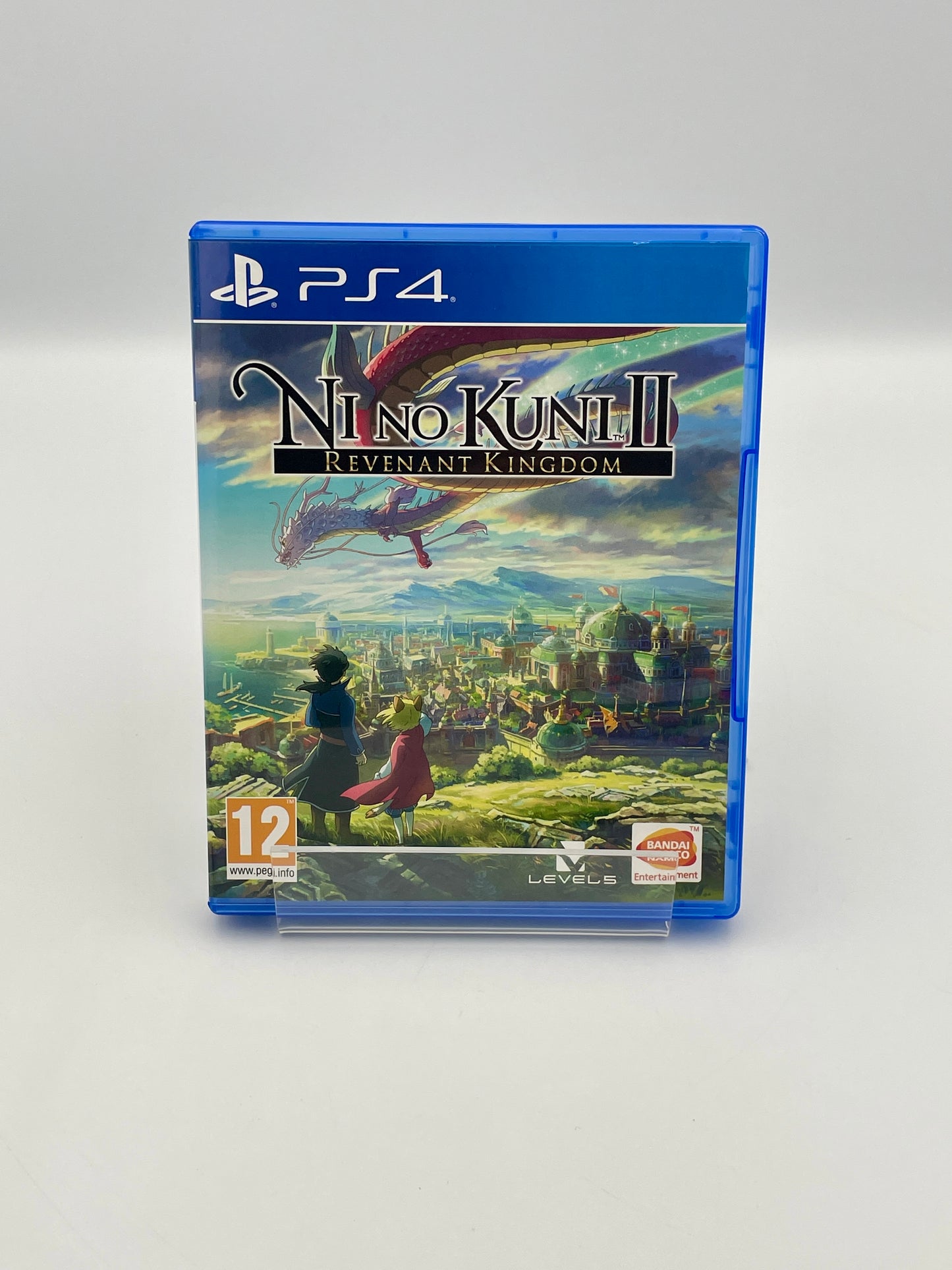 PlayStation 4 game case for 'Ni no Kuni II: Revenant Kingdom' on a white background