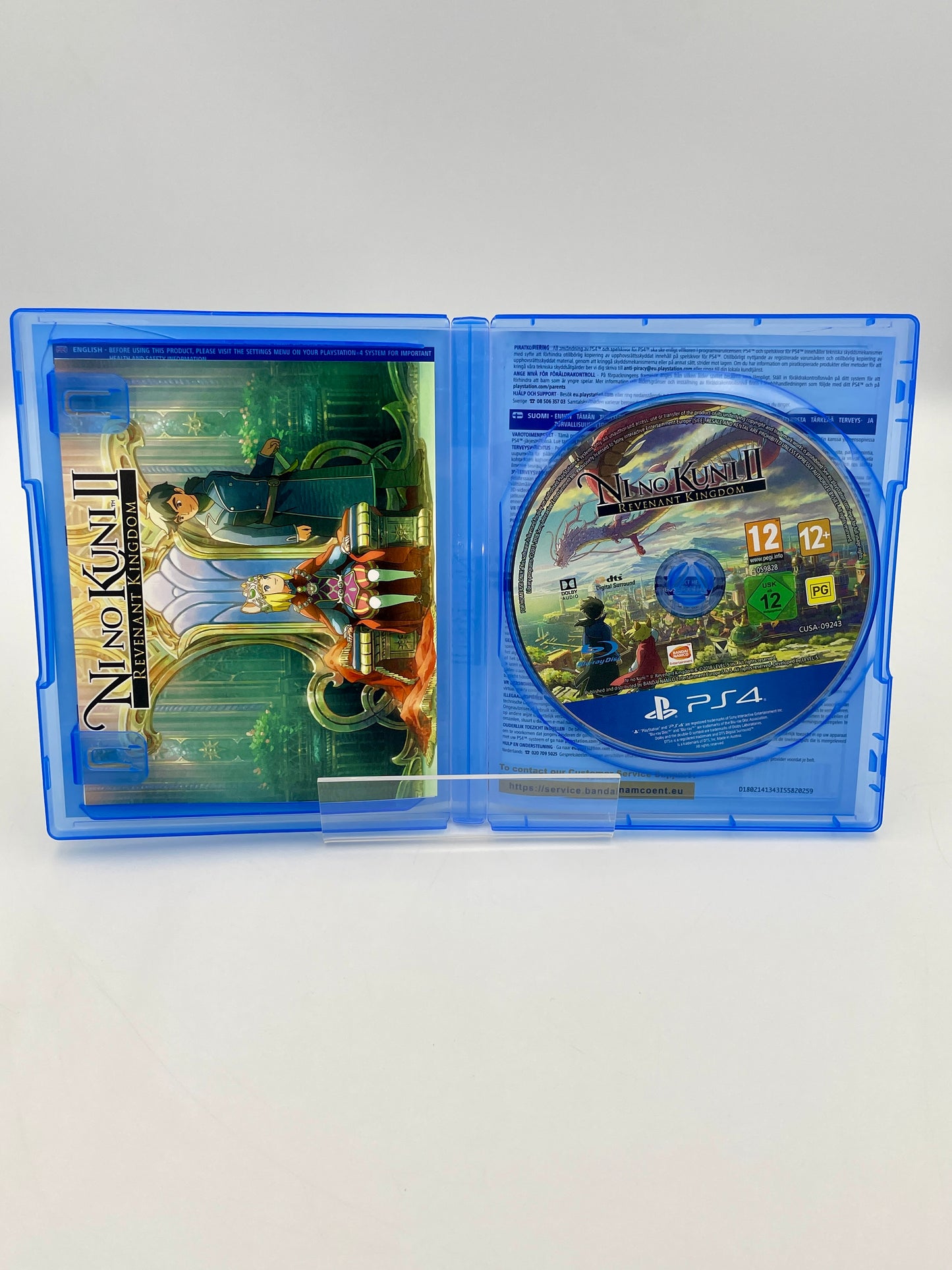 PlayStation 4 game disc in a blue case with cover on a white background
