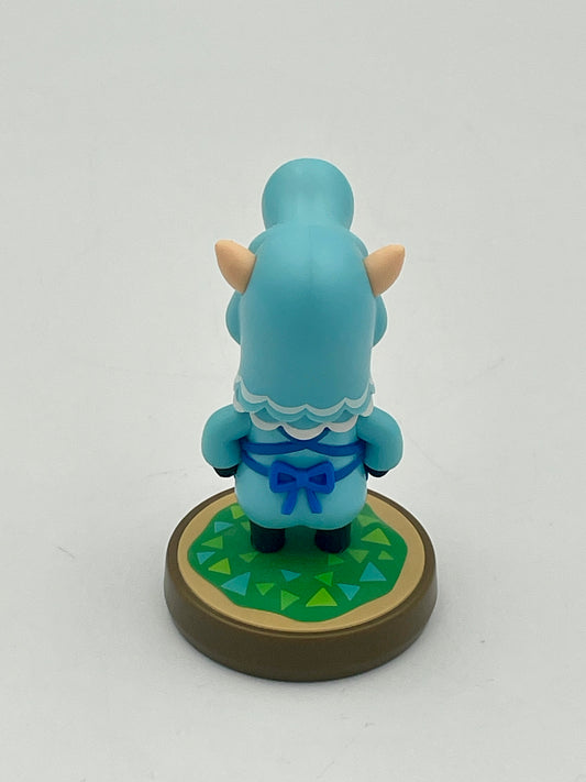 Blue cartoon-like figurine with a green base on a white background