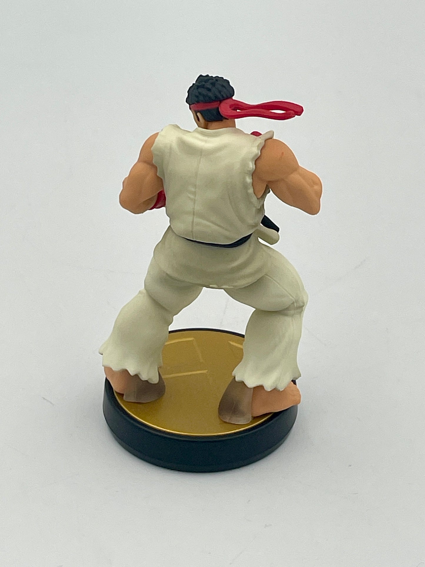 Action figure of a character in a fighting pose on a white background