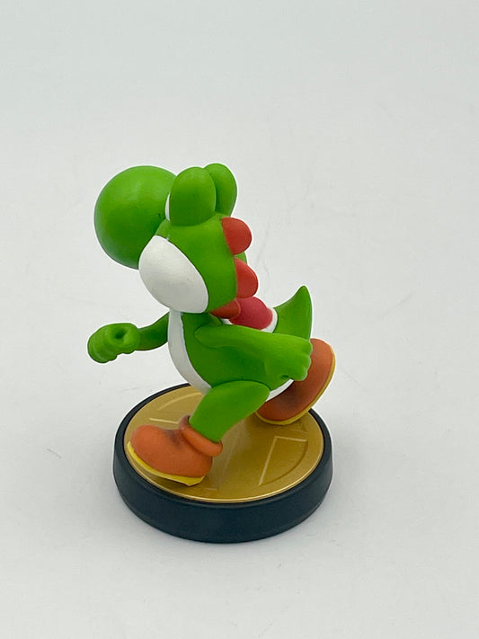 Green dinosaur-like figure on a black base with a white background