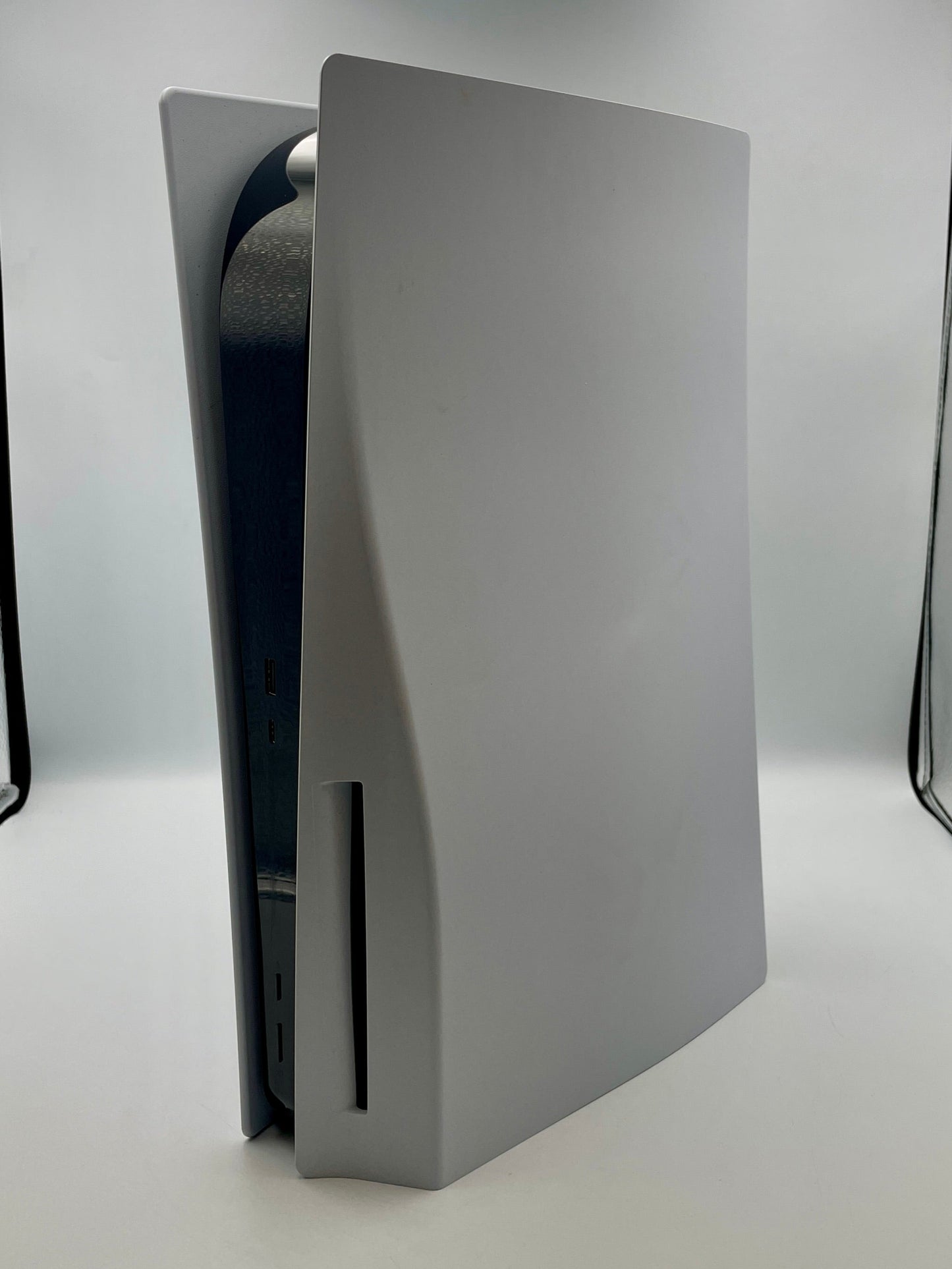 White PS5 console on a white background