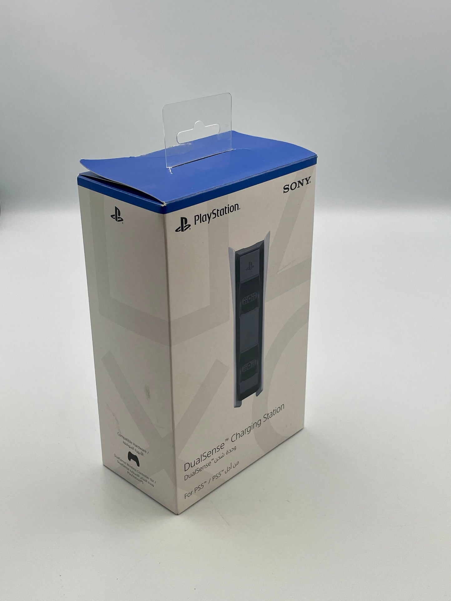 PlayStation busmate charging station packaging on a gray background