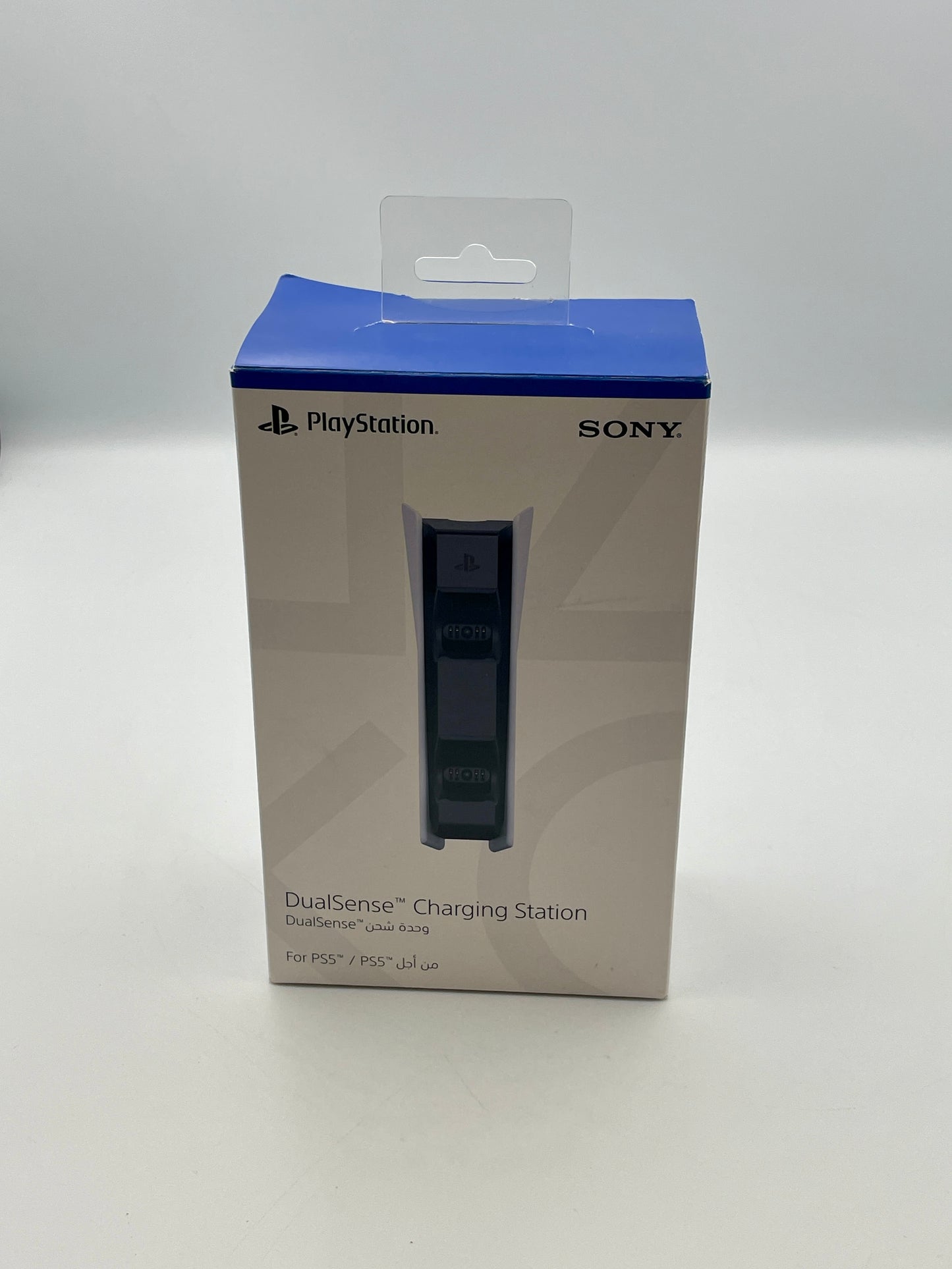 PlayStation DualSense charging station packaging with Sony branding on a white background