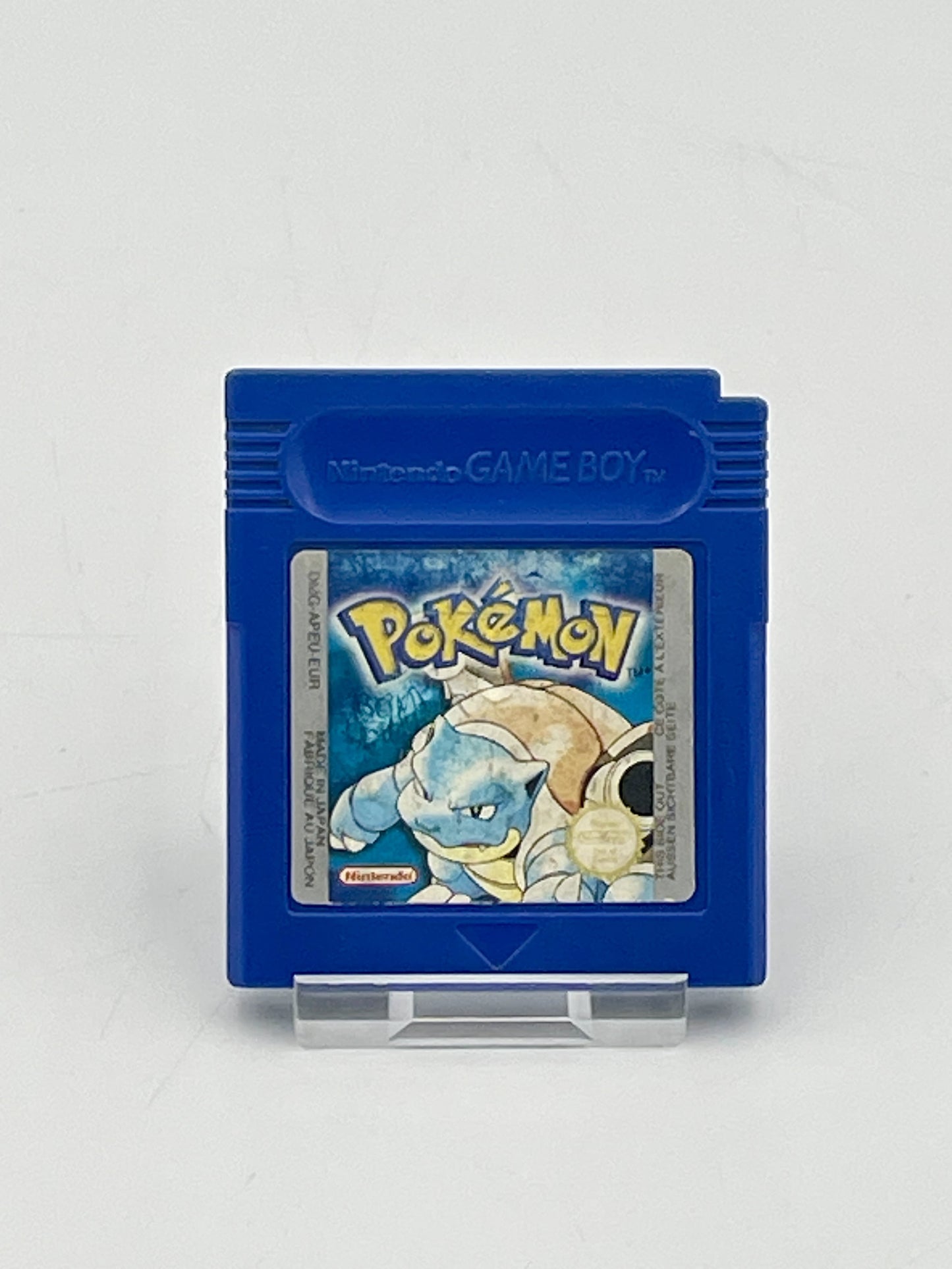 Blue Game Boy cartridge with a Pokémon game on a white background