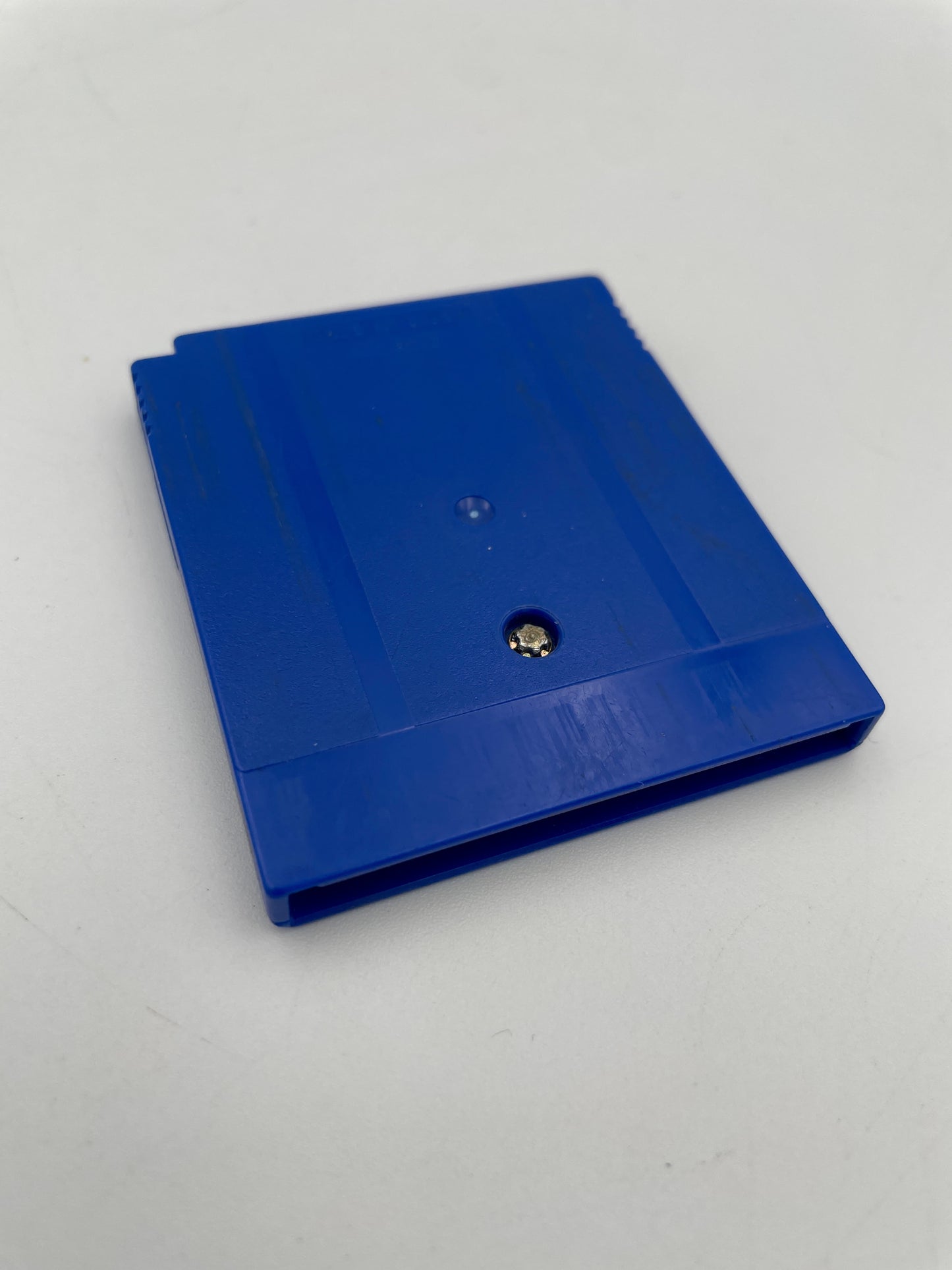 Blue plastic sheet with a central hole on a white background