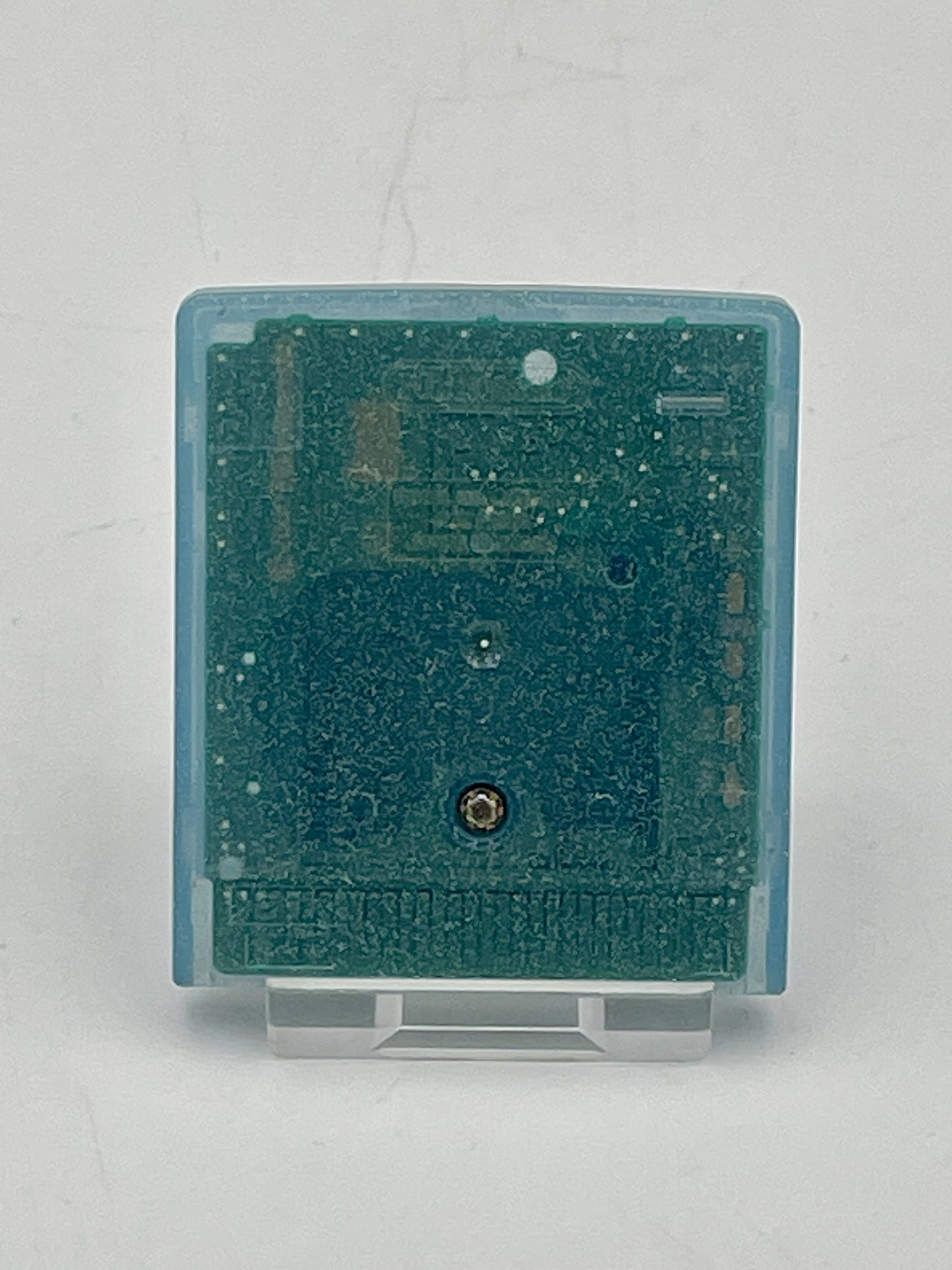 Electronic component with a blue casing on a white background