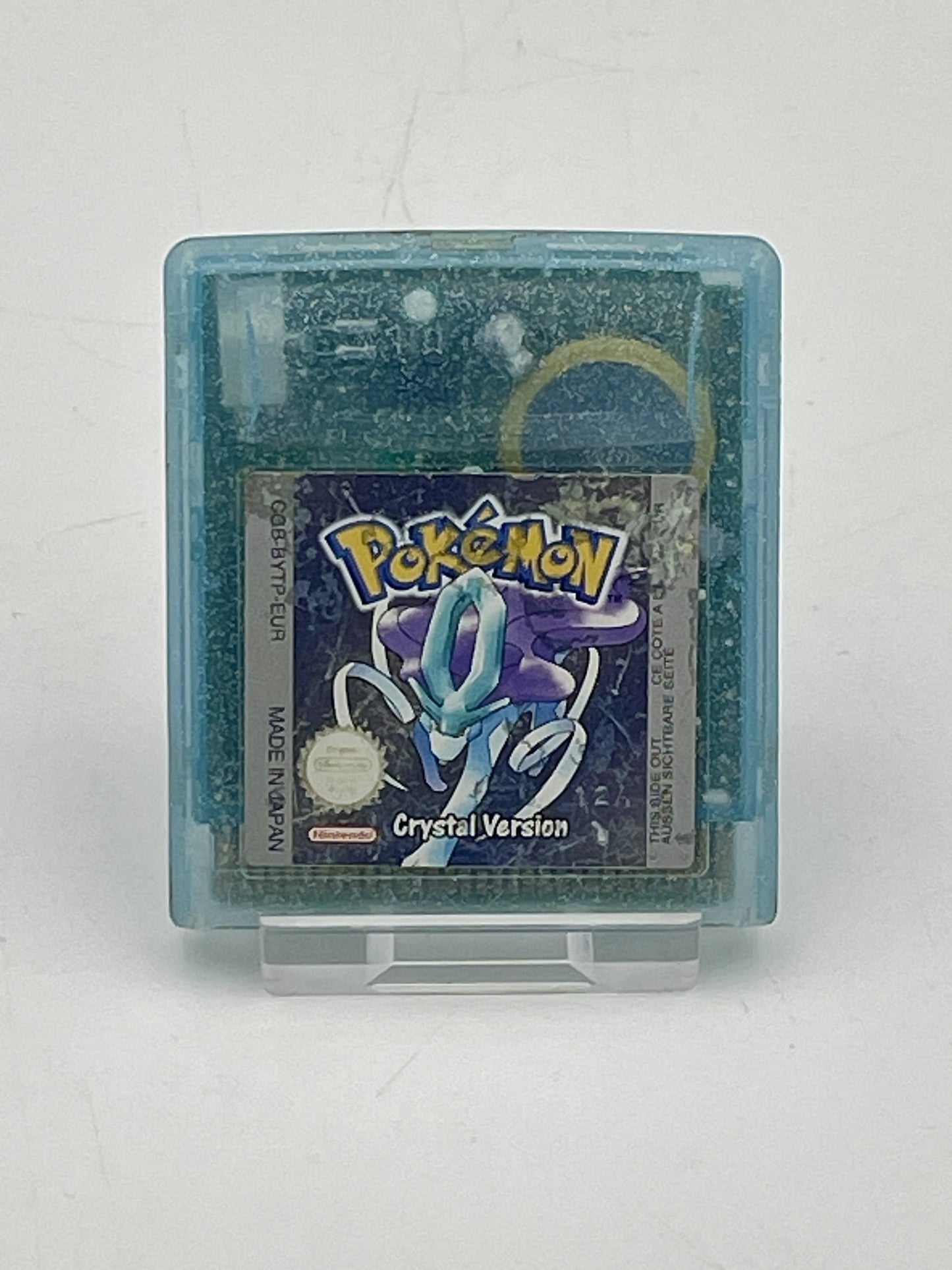 Pokémon Crystal Version game cartridge on a white background