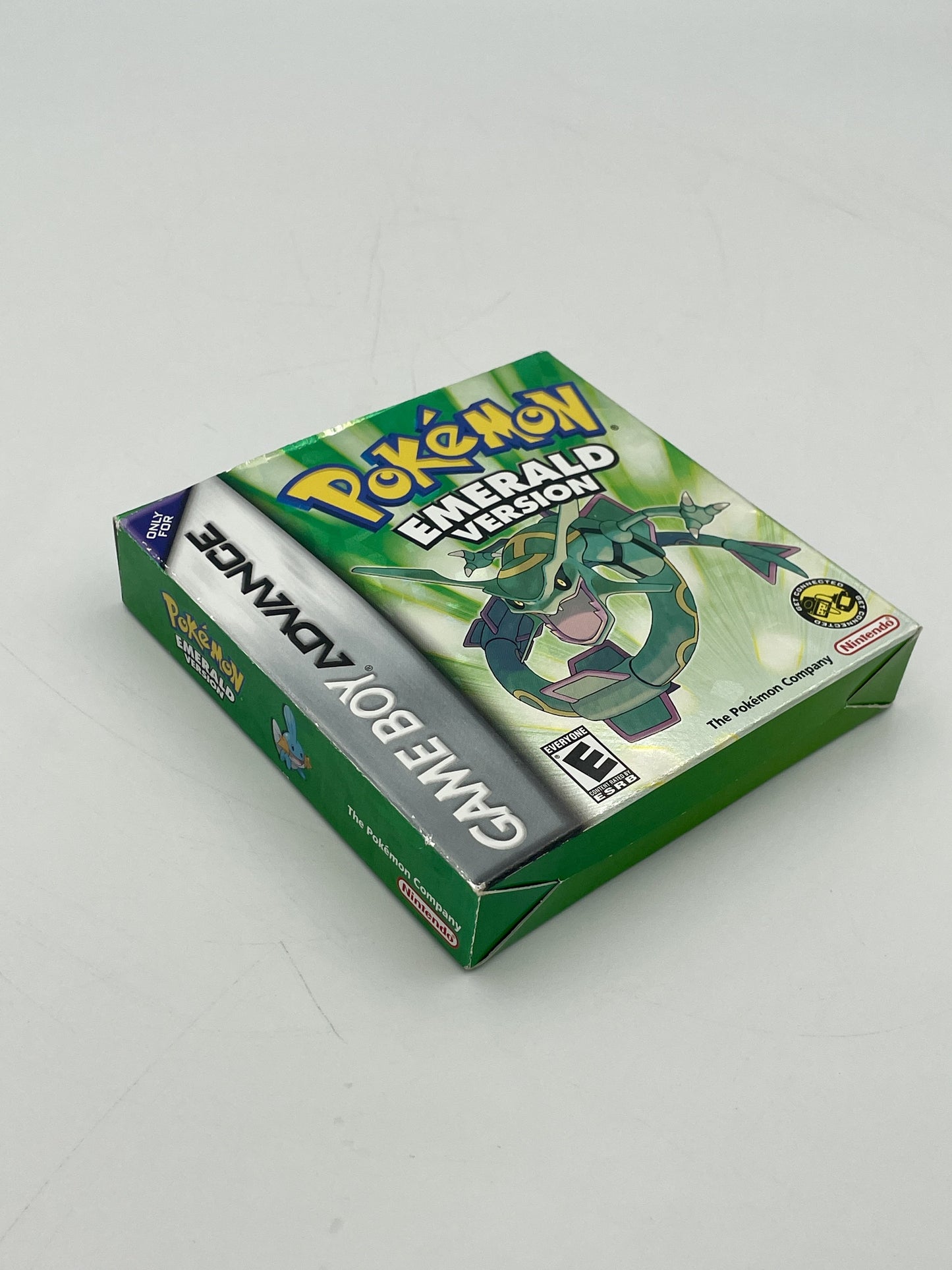 Pokémon Emerald Version game box on a white background