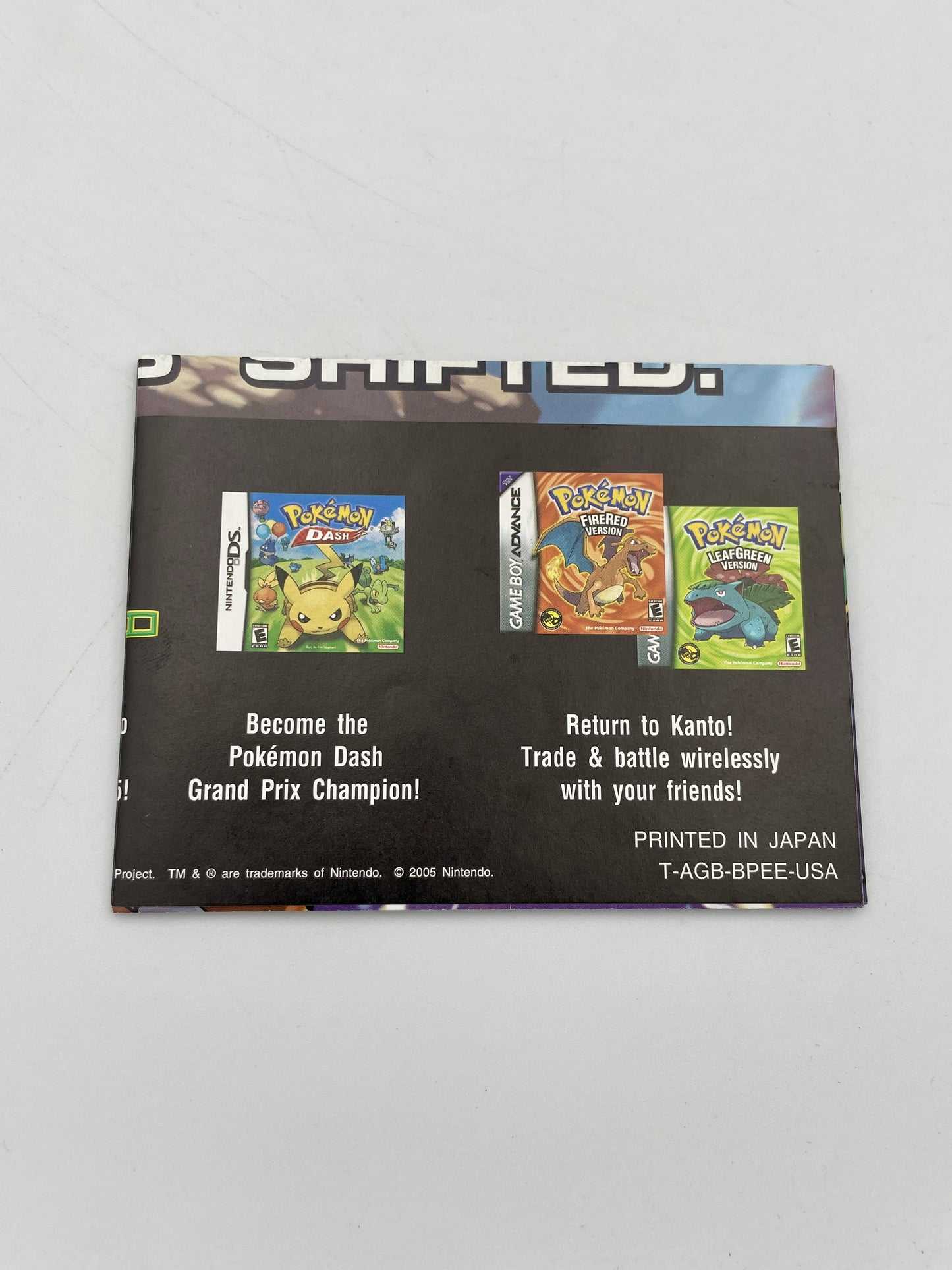 Pokémon trading card game packaging with Pokémon characters on a gray background