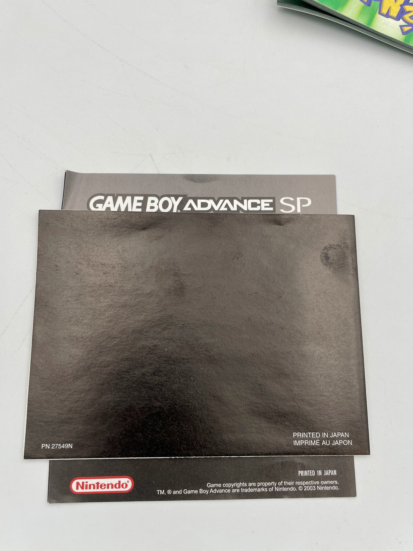 Nintendo Game Boy Advance SP case on a light gray background
