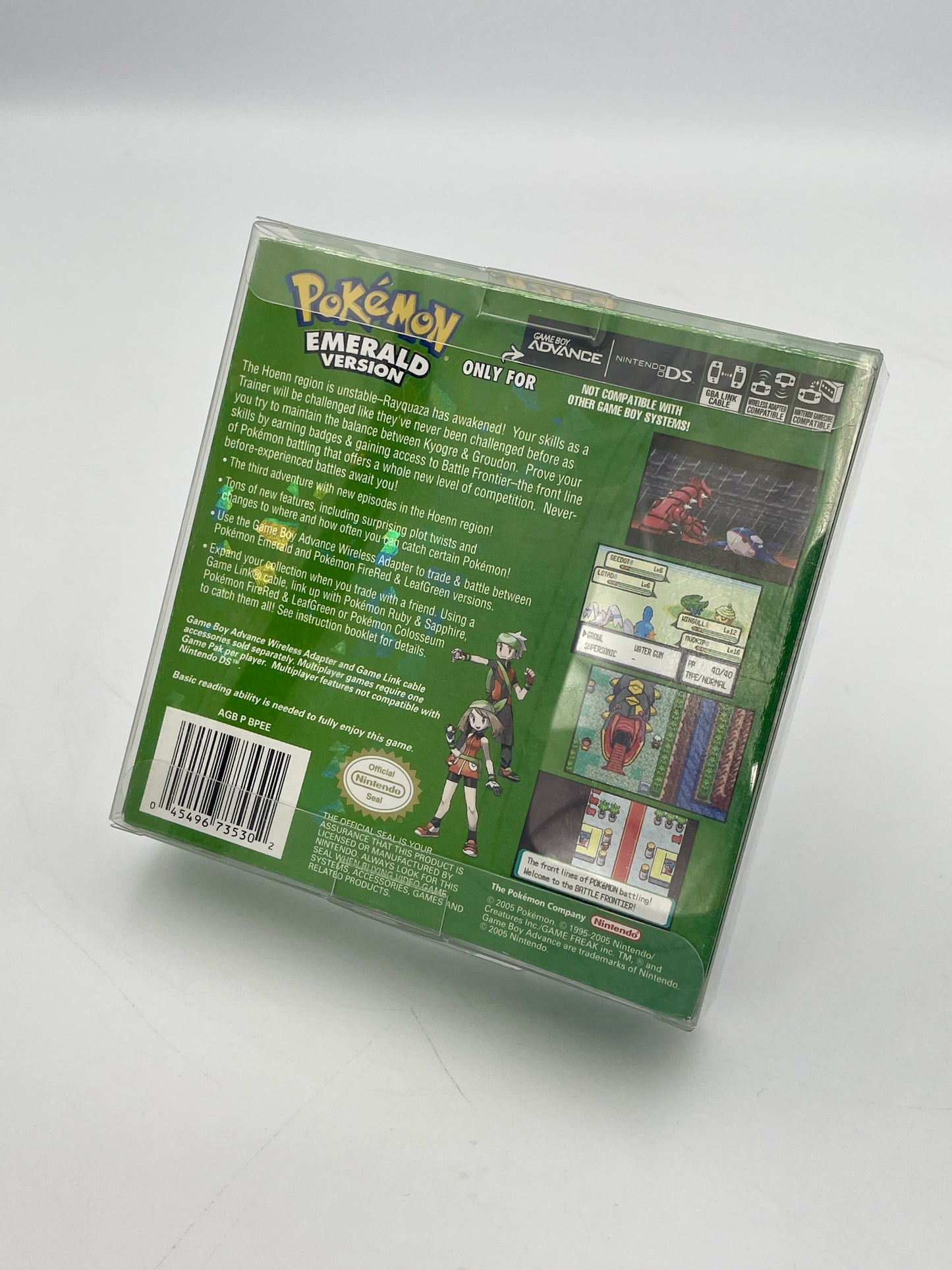 Pokémon Emerald Version game case on a white background
