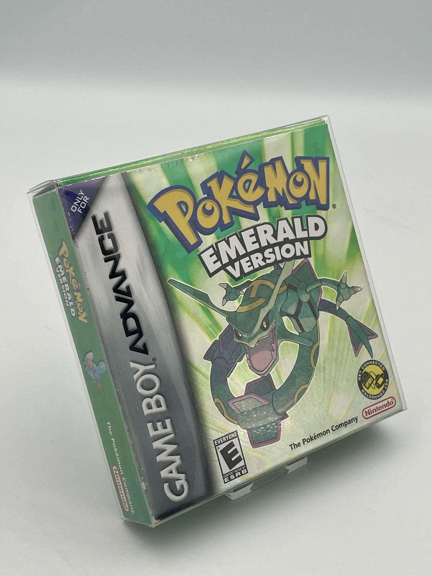 Pokémon Emerald Version Game Boy Advance game case on a white background