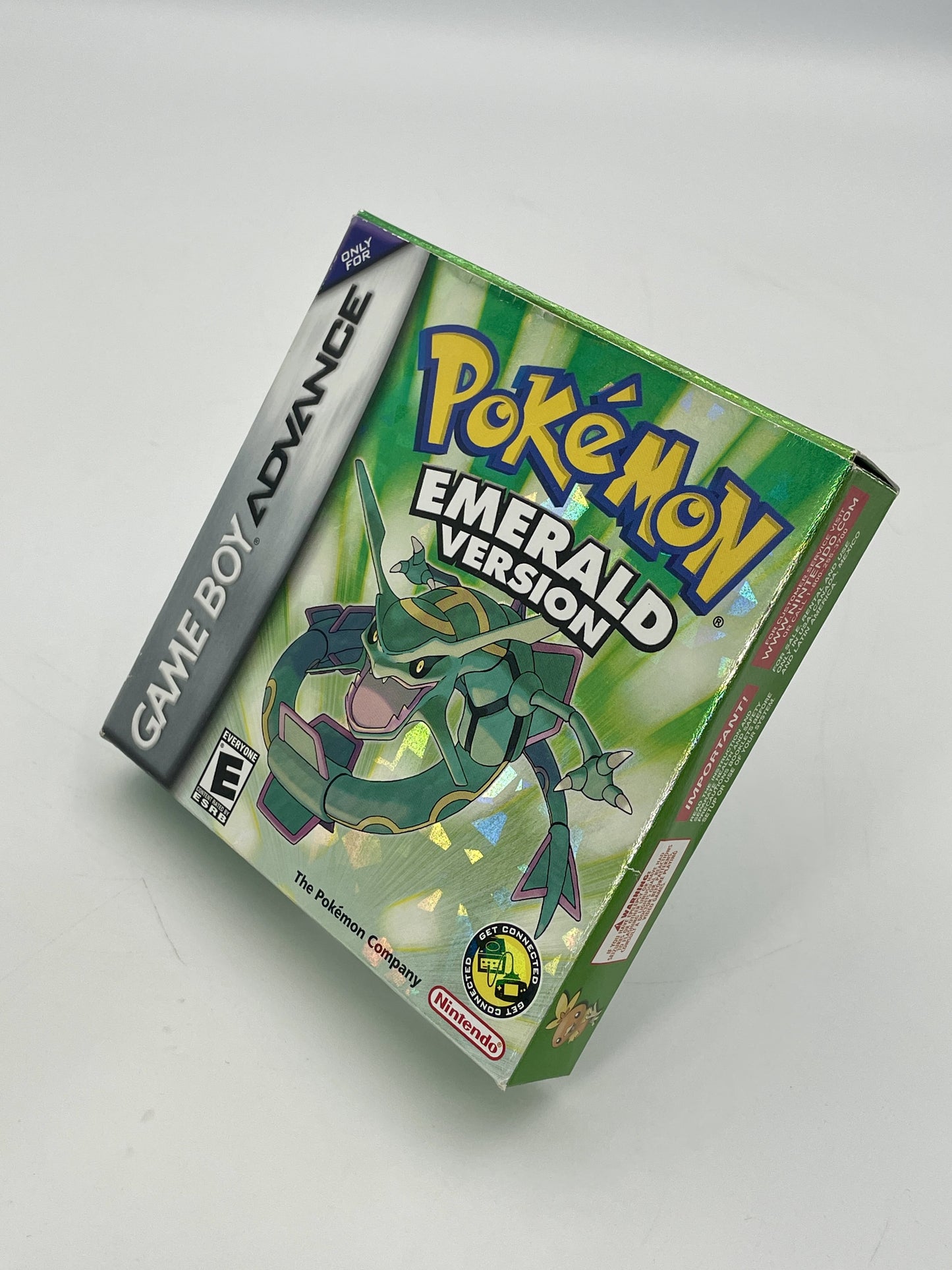 Pokémon Emerald Version Game Boy Advance game case on a white background