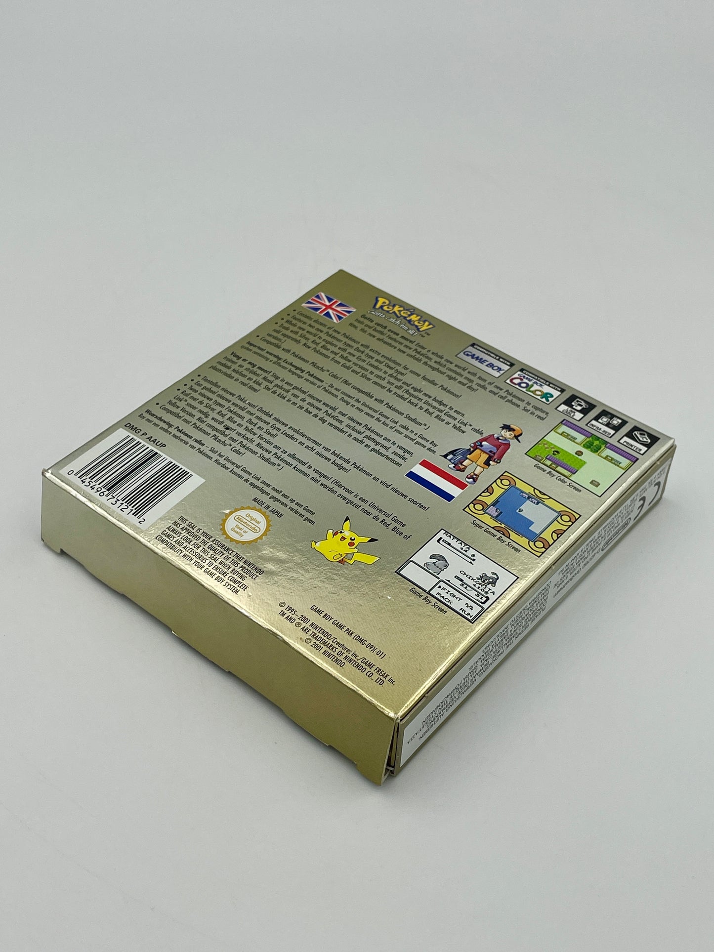 Gold-colored product packaging with text and graphics on a gray background