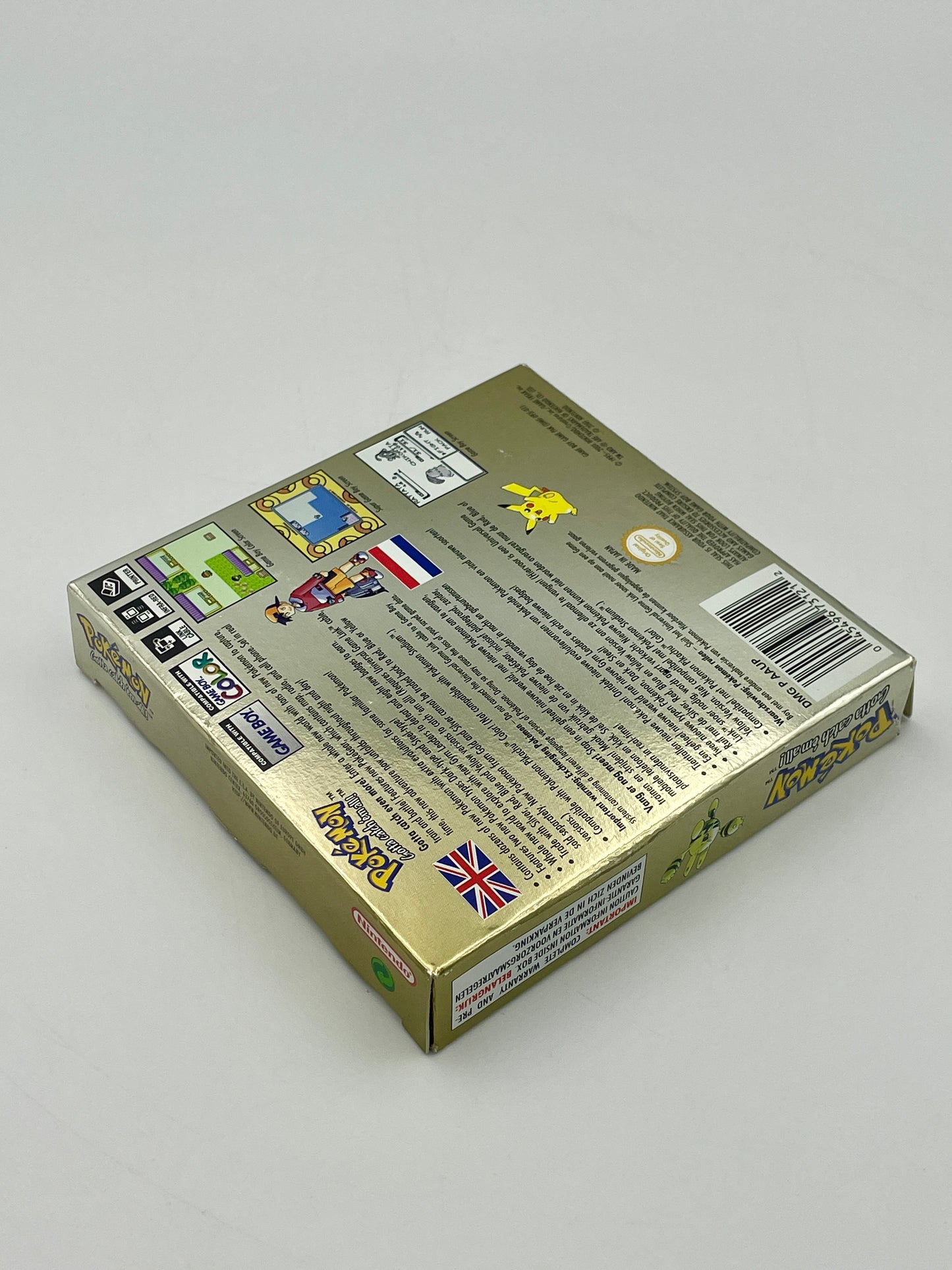 Gold-colored product packaging with text and graphics on a gray background
