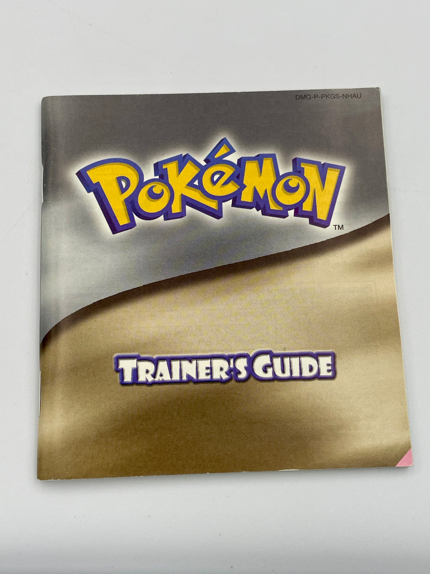 Pokémon Trainer's Guide book on a white background