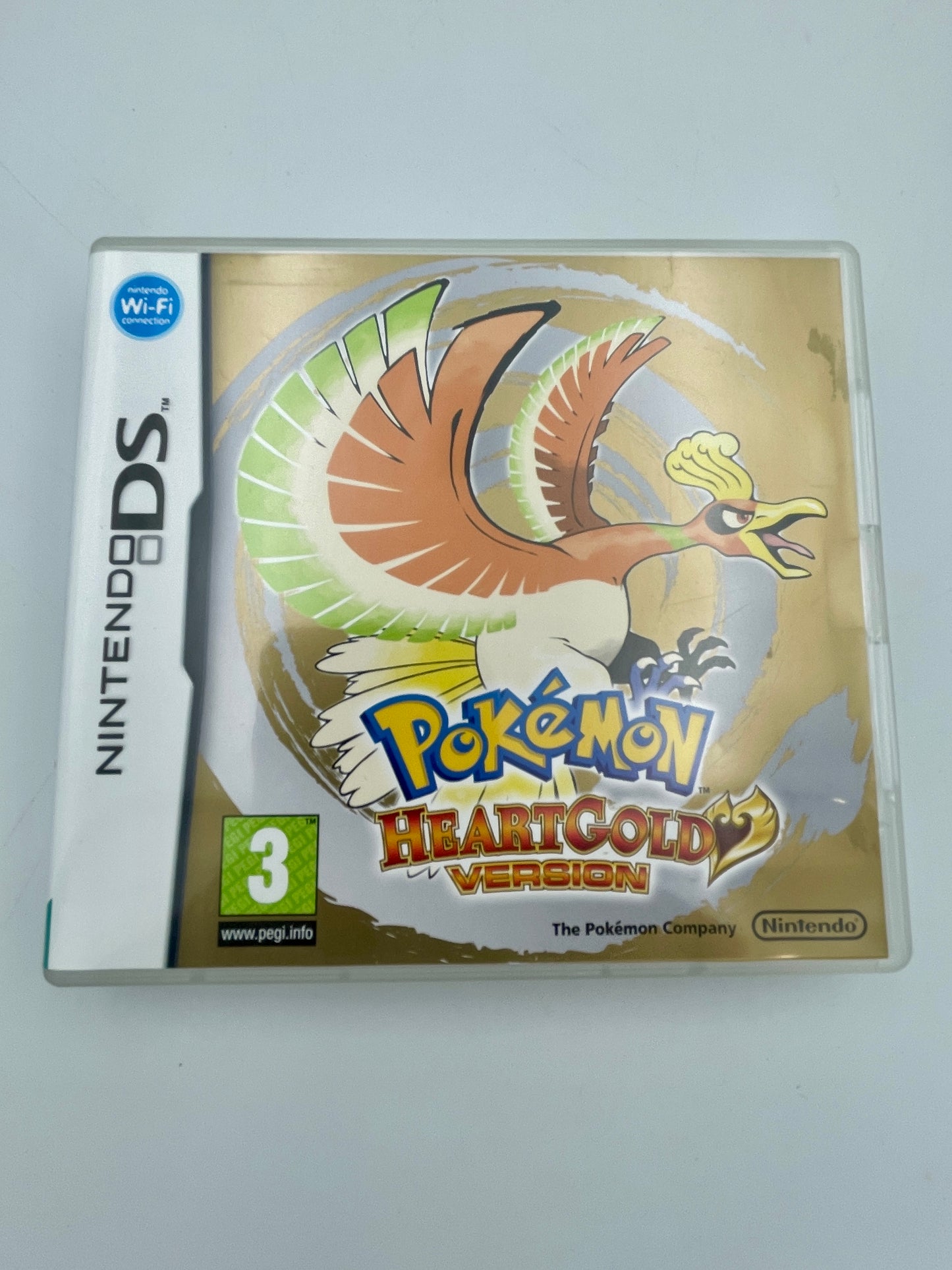Pokémon HeartGold Version game case for Nintendo DS on a white background
