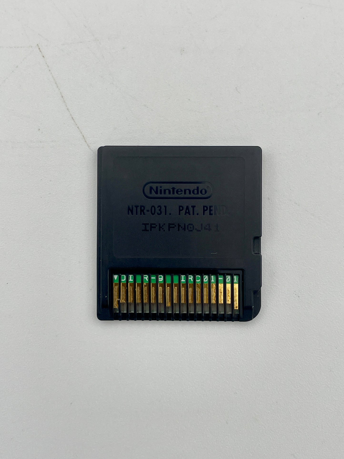 Nintendo game cartridge on a light gray background