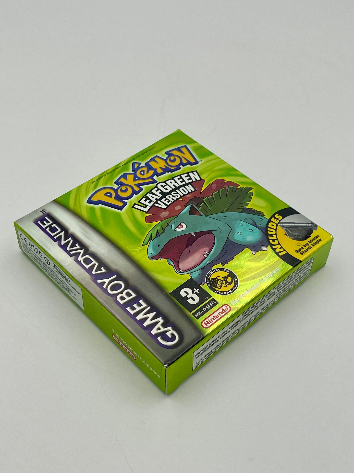 Pokémon Game Boy Advance Leaf Green Version packaging on a light gray background