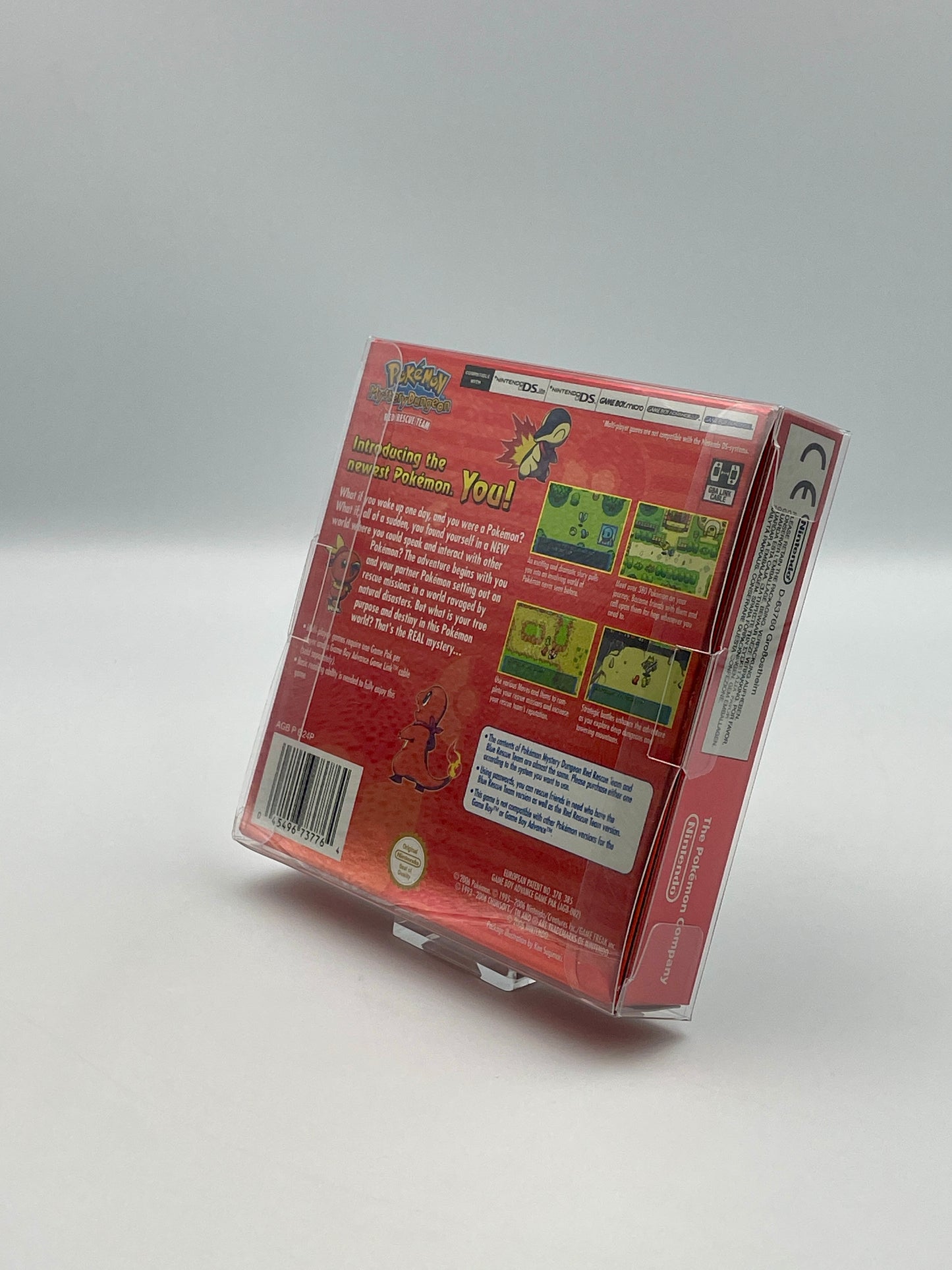 Back view of a red game box with text and graphics on a gray background