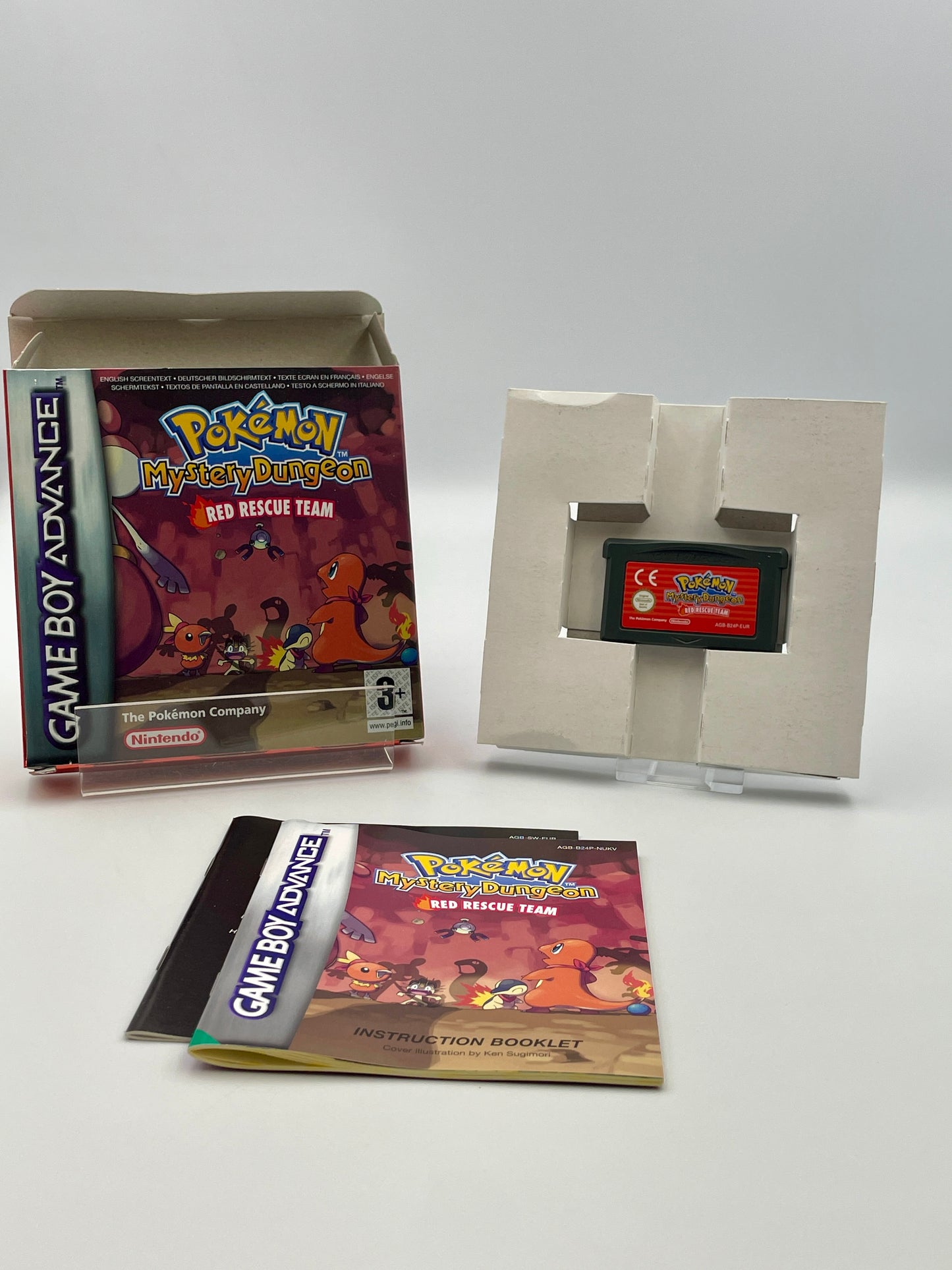 Pokémon Mystery Dungeon Red Rescue Team Game Boy Advance game cartridge with packaging and manual on a white background