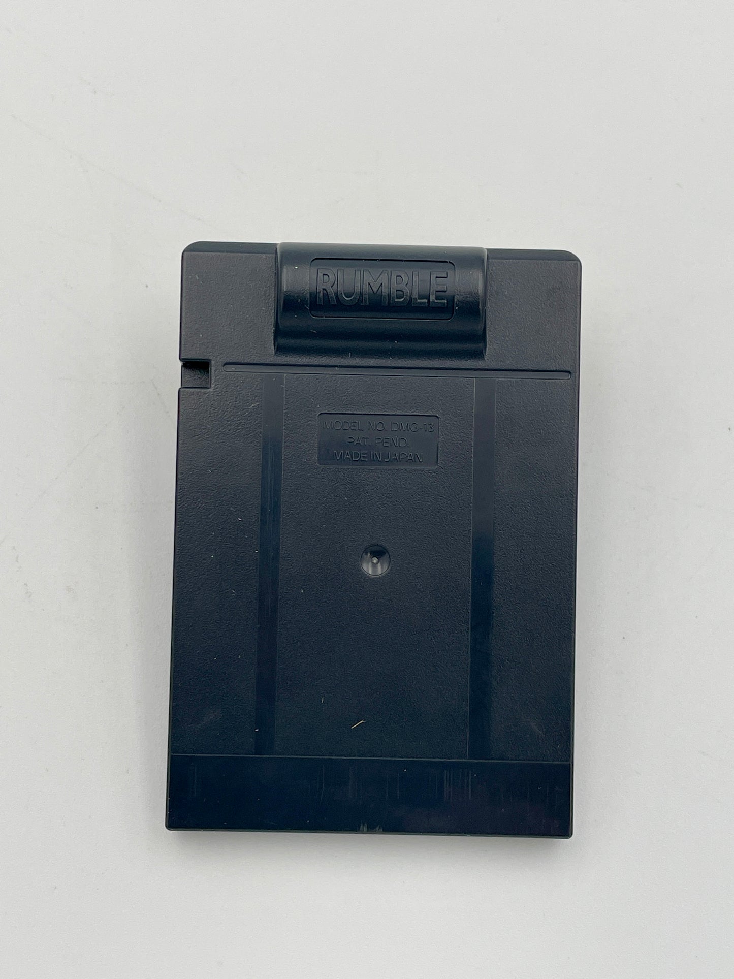 Black rectangular device with 'Rumble' branding on a light gray background