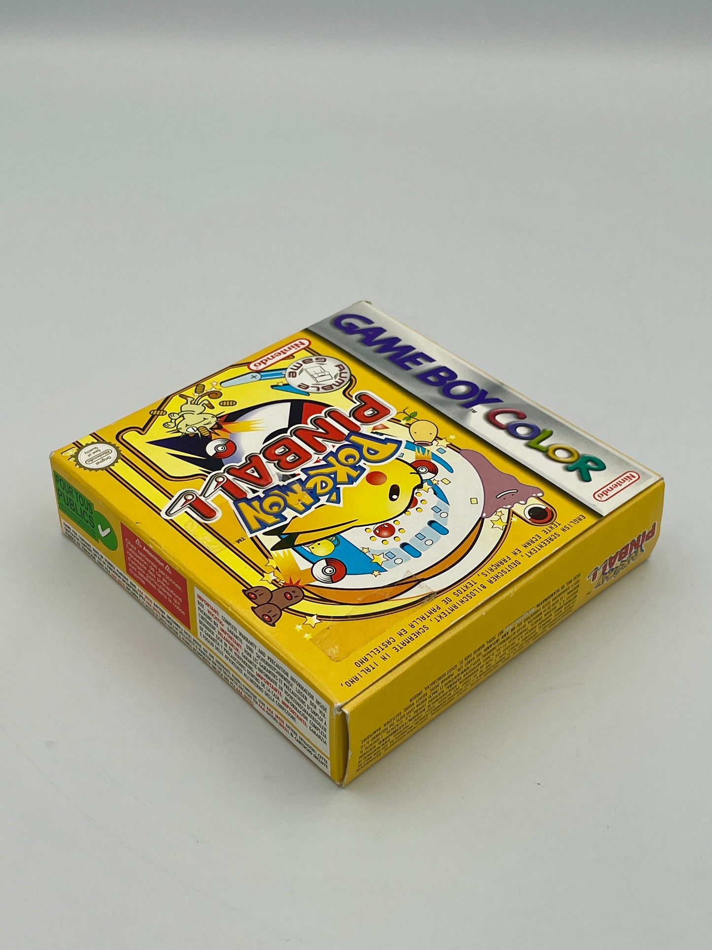Game Boy Color game case with a colorful design on a gray background