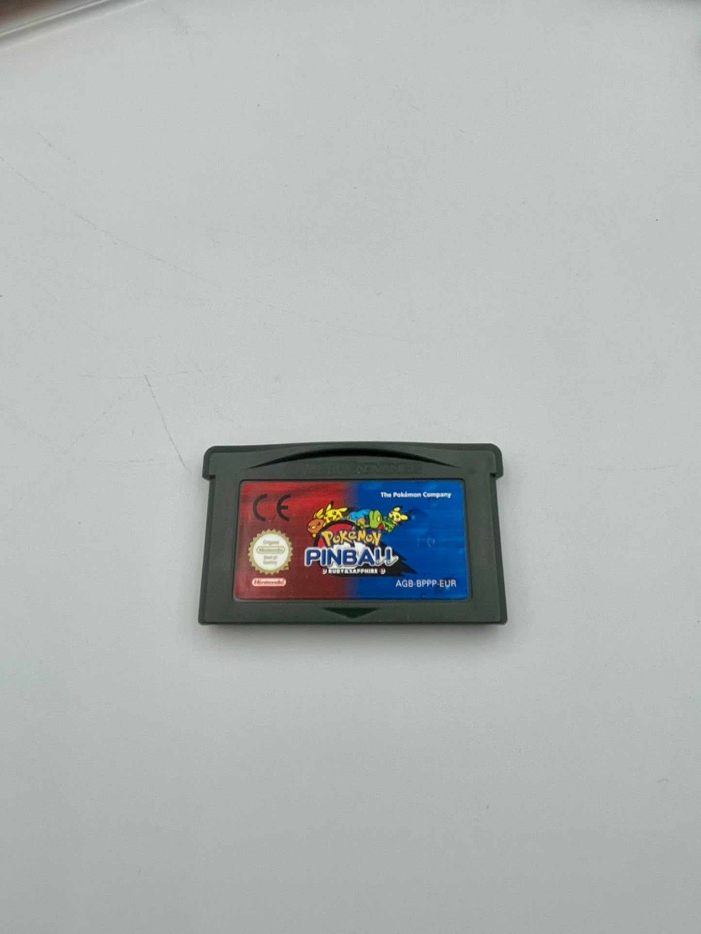 Game cartridge for 'Pokémon Pinbaç' on a light gray background