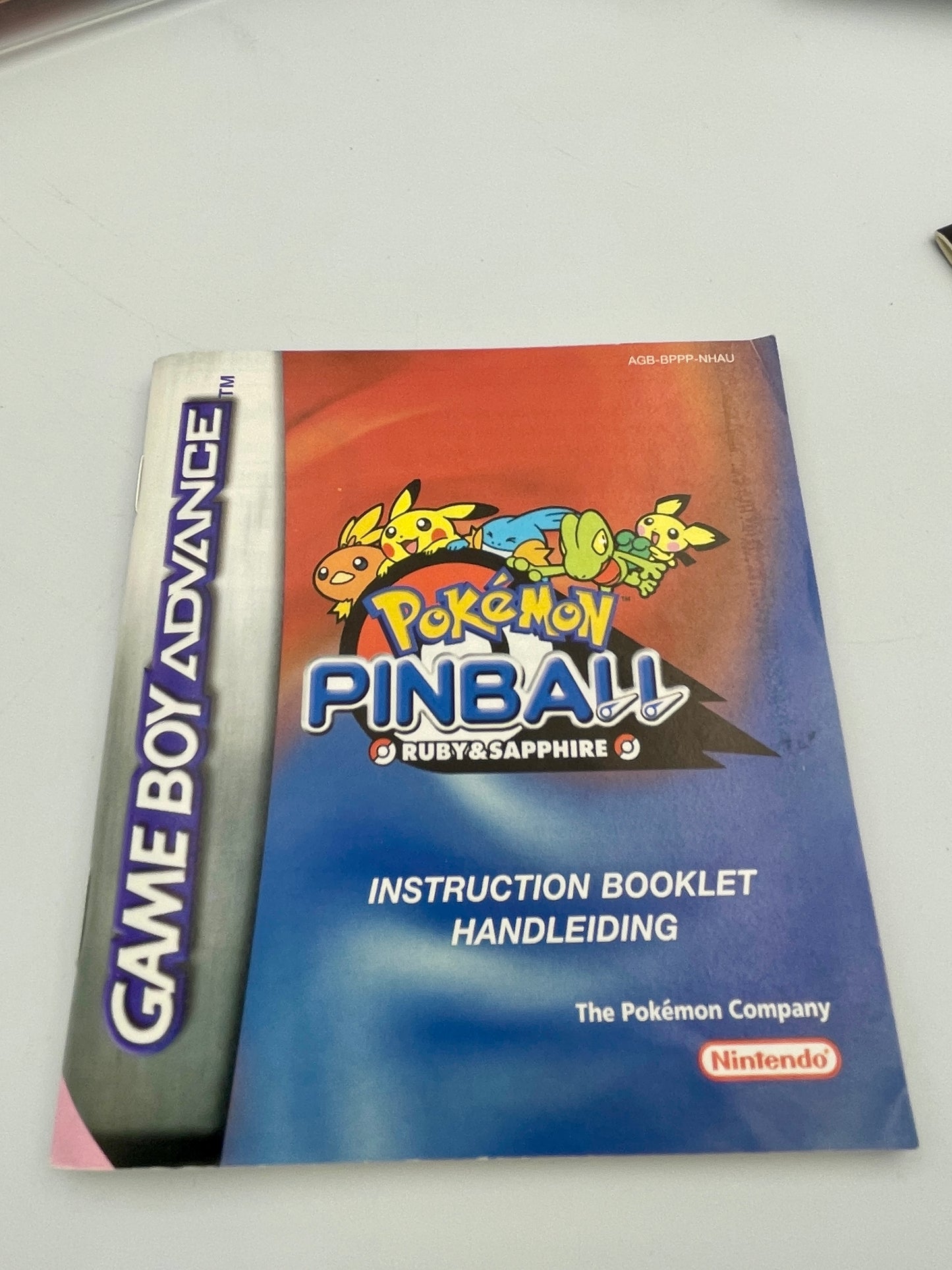 Instruction booklet for Pokémon Pinball Ruby & Sapphire on Game Boy Advance with colorful design.
