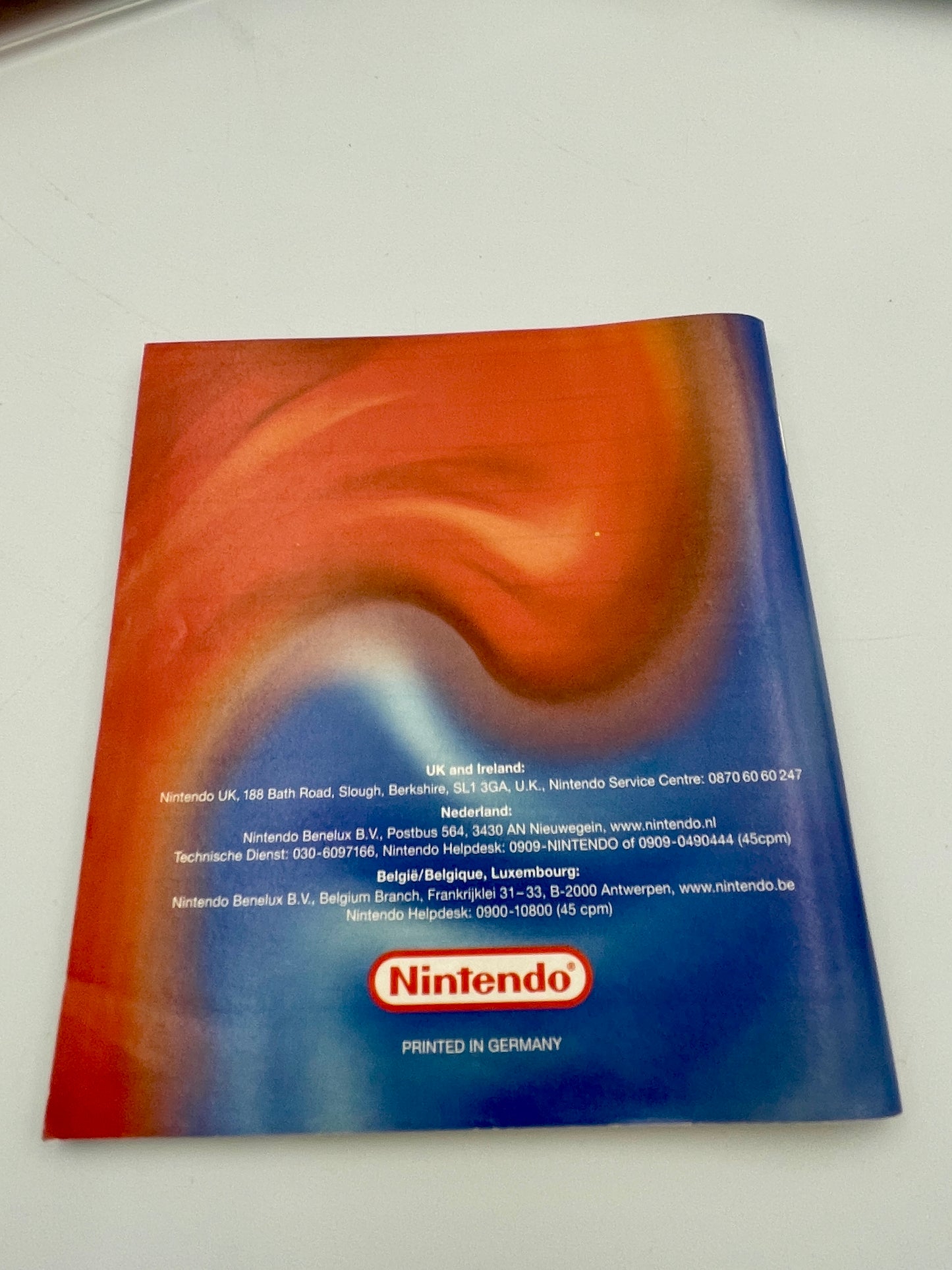 Nintendo branded product packaging with red and blue design on a white background