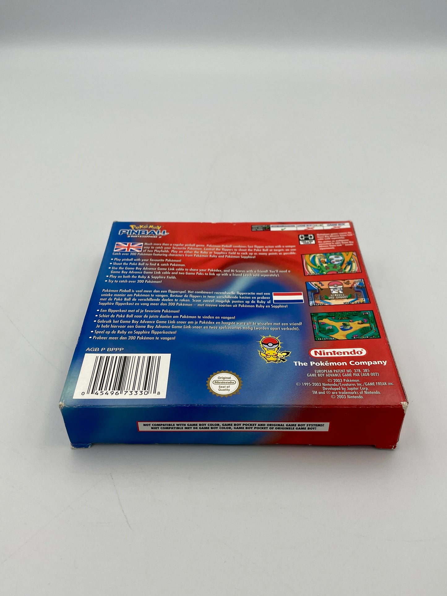 Back view of a red and blue game box with branding on a white background
