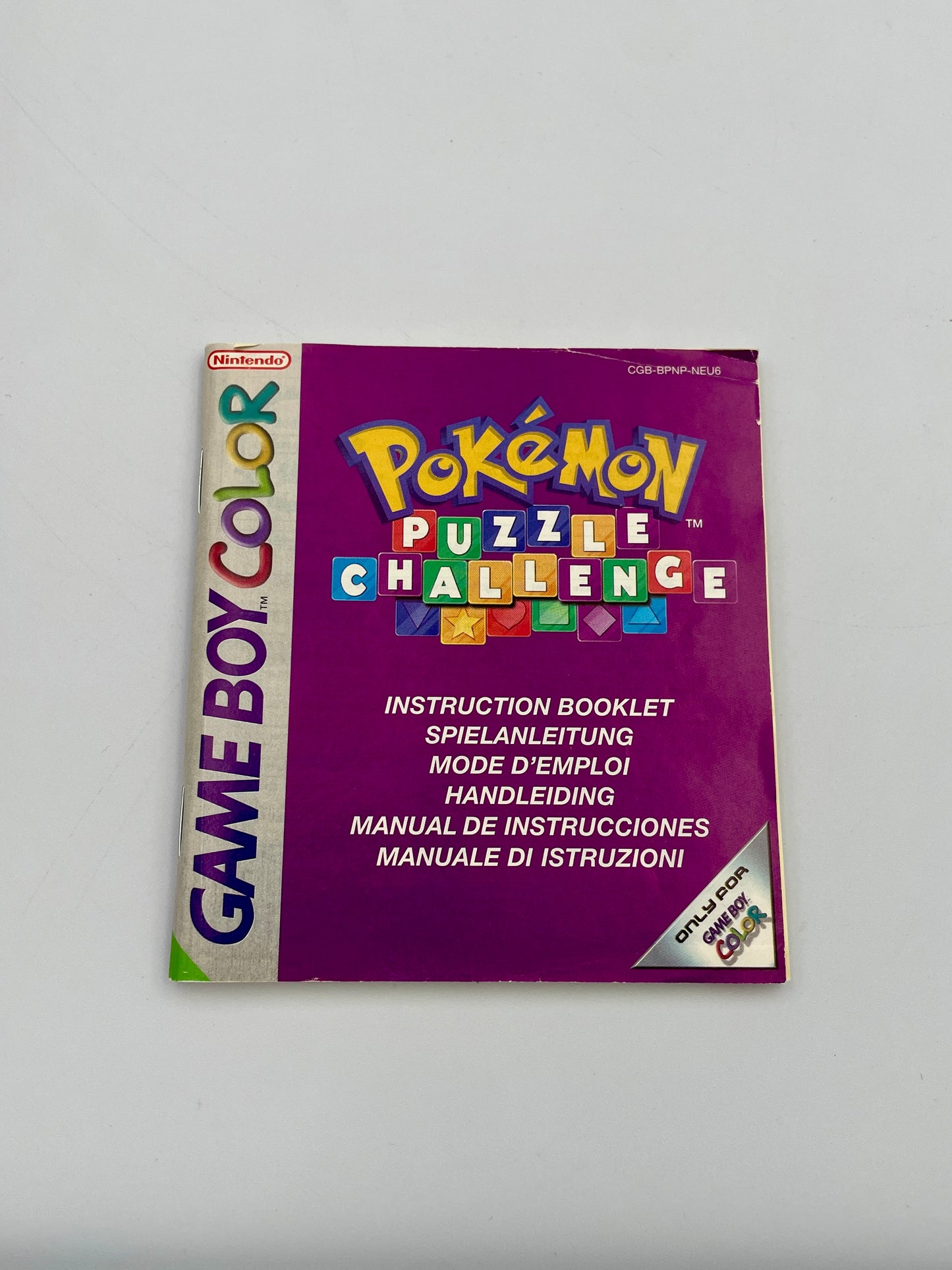 Pokémon Puzzle Challenge Game Boy Color instruction booklet on a white background