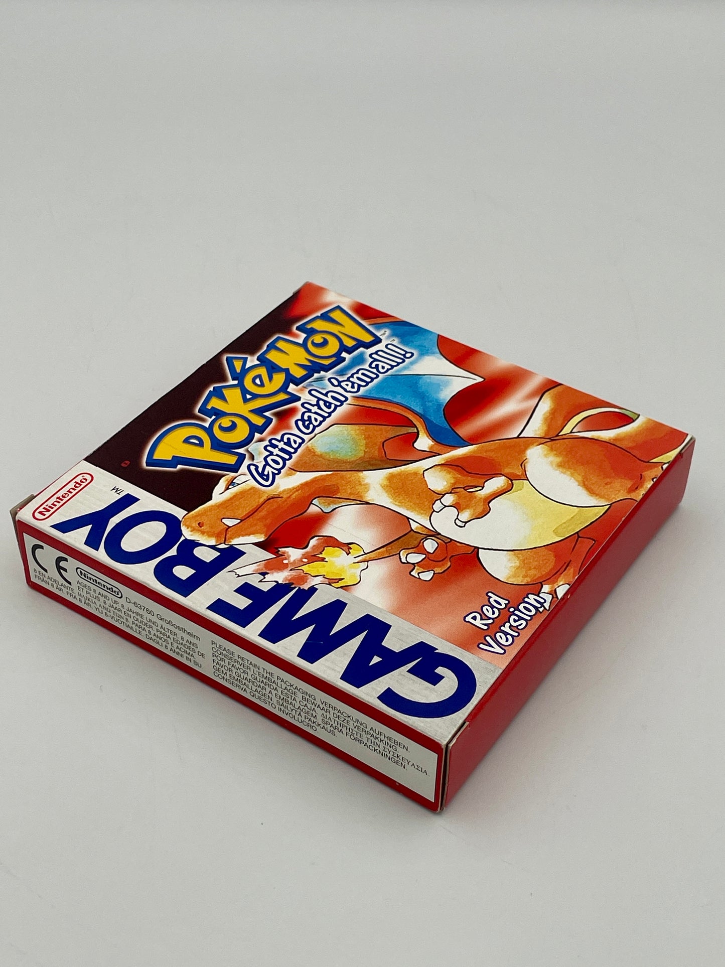 Box of Game Boy with cartoon characters on a white background