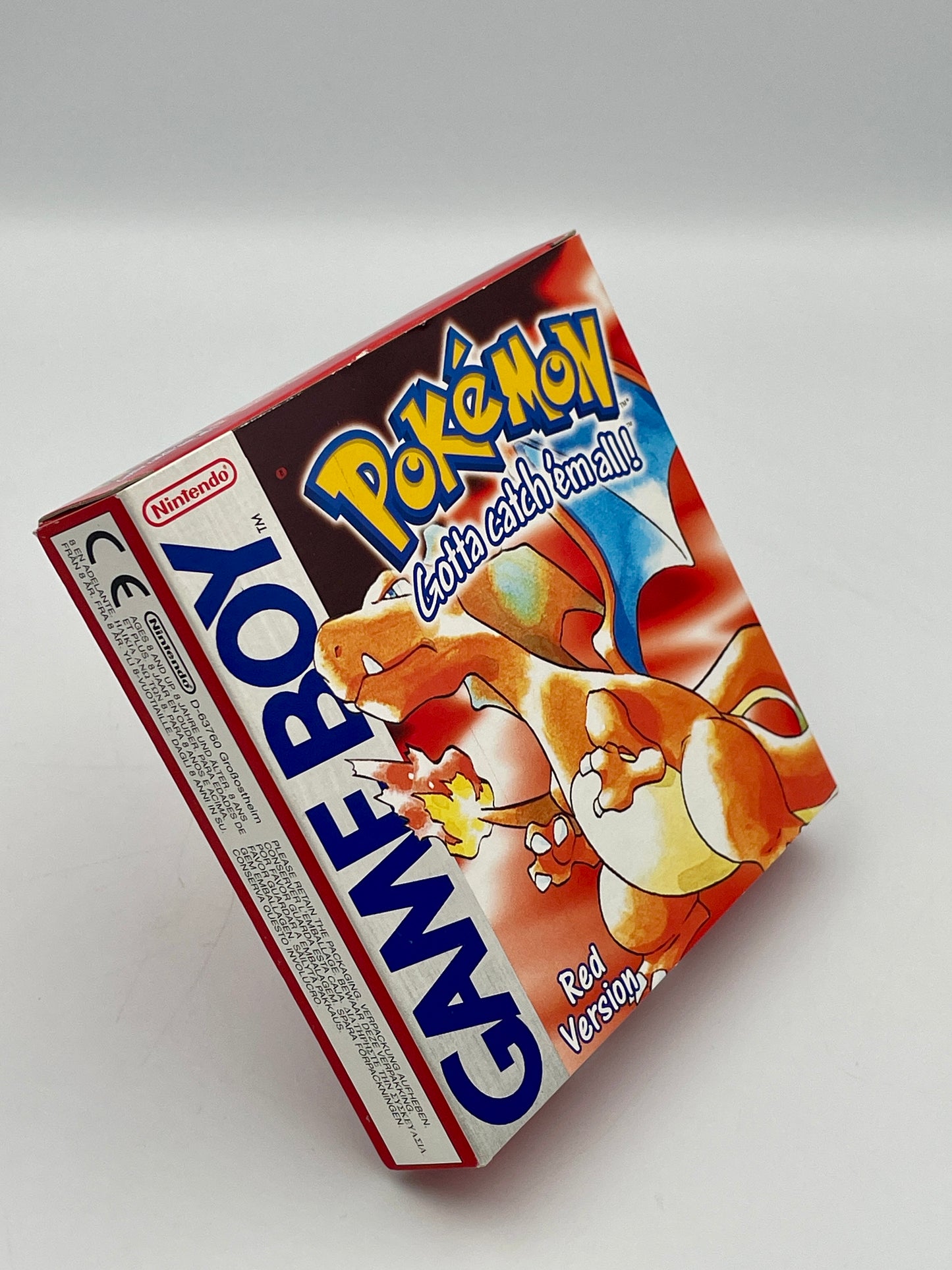 Red version of the Pokémon Game Boy packaging on a white background